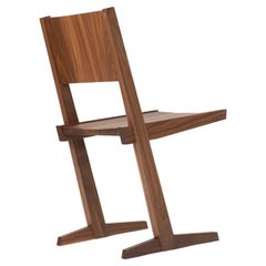cantilevered chair #3 handcrafted from solid black walnut with oil finish
