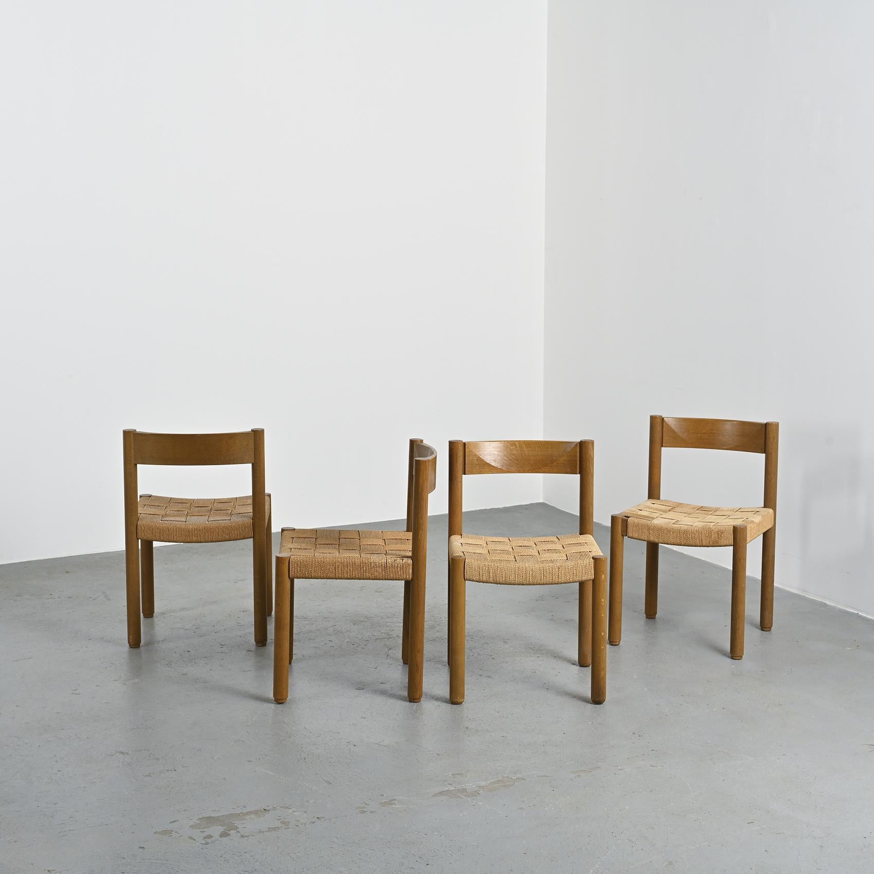 Set of Four Model 6200 Chairs by Robert & Trix Haussmann for Dietiker, Switzerland, 1963

Set of four Model 6200 dining chairs in solid oak with beautifully handwoven rope seats.

Designed by Robert and Trix Haussmann, one of the most influential