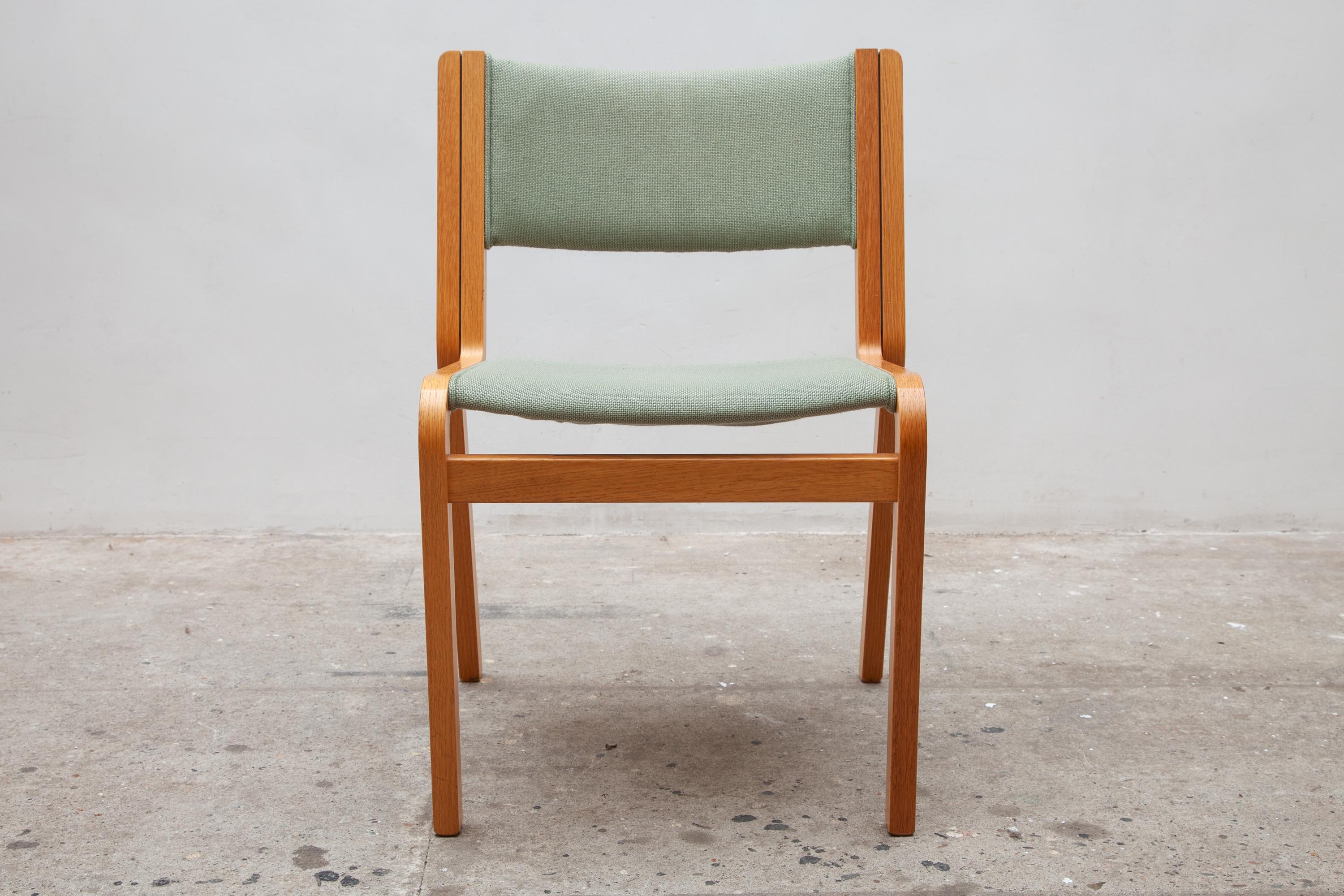 A high quality of curved laminated wooden stacking chairs with woven wool upholstery in olive green.
Set of 24 stacking chairs available, price a piece.

Johnny Sorensen was born in Helsingor, son of factory workers and appointed as unskilled