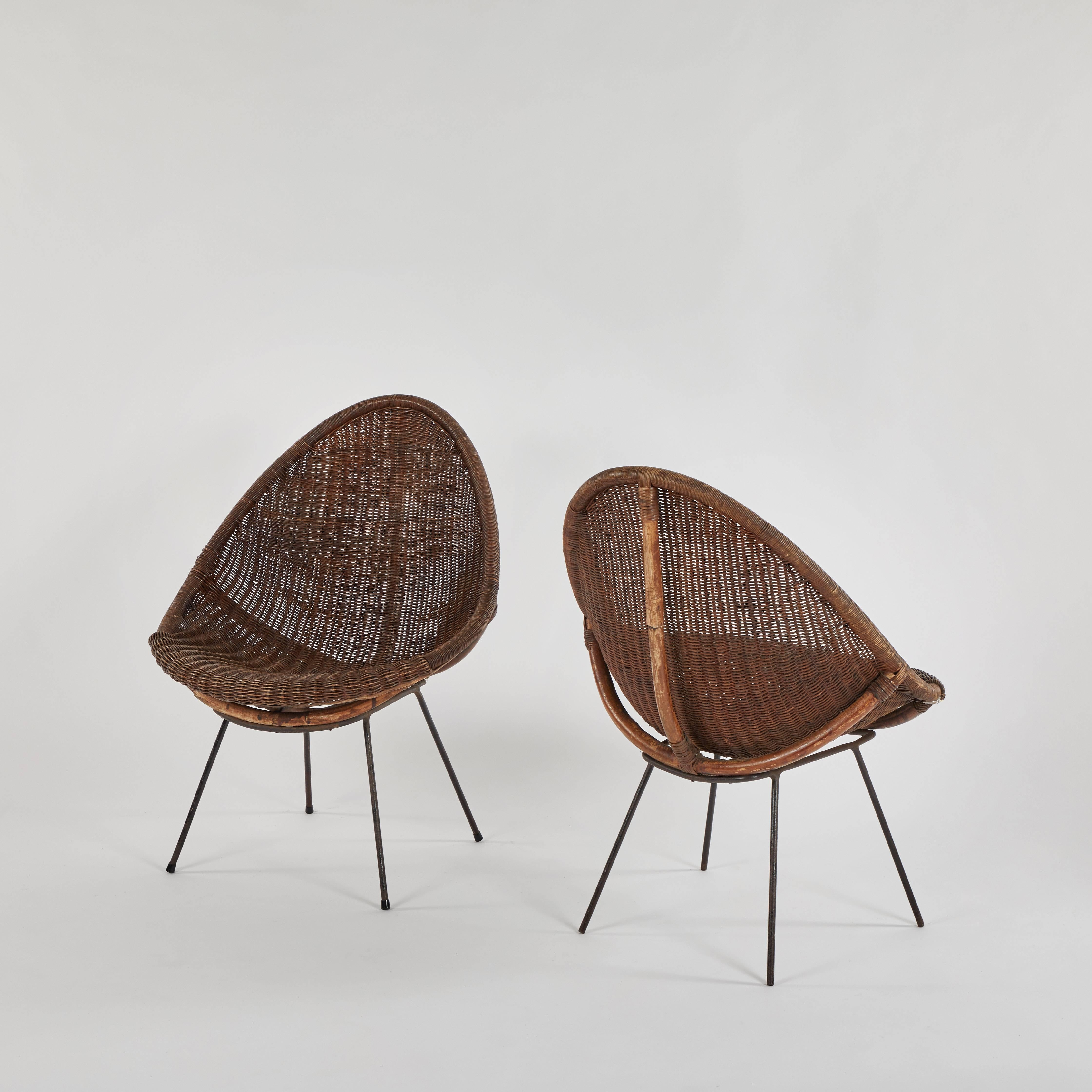 Pair of mid-century bamboo and rattan chairs from France. 