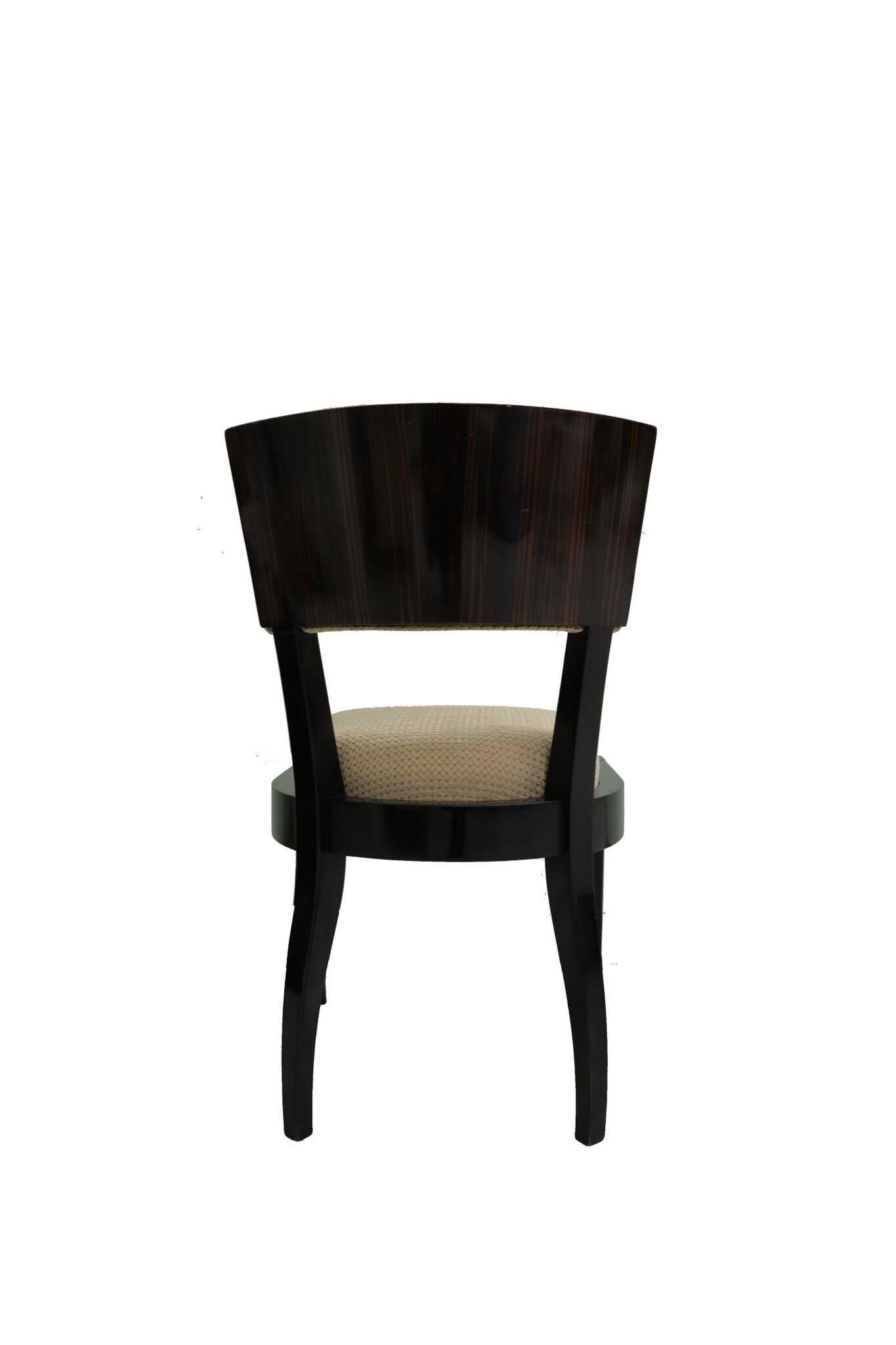 Six Art Deco dining chairs of Macassar ebony wood frame with beige fabric.