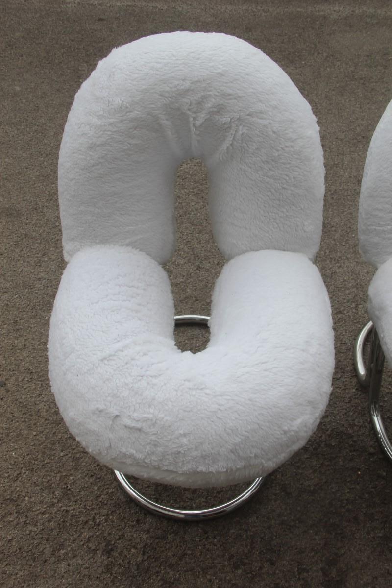 Chairs Italian design steel Peluche hairy fabric white silver Nanda Vigo style 1970s donut form.

The shape and how much fun is very special, of an extraordinary comfort, the fabric is removable and washable.
Very reminiscent of the Nanda Vigo