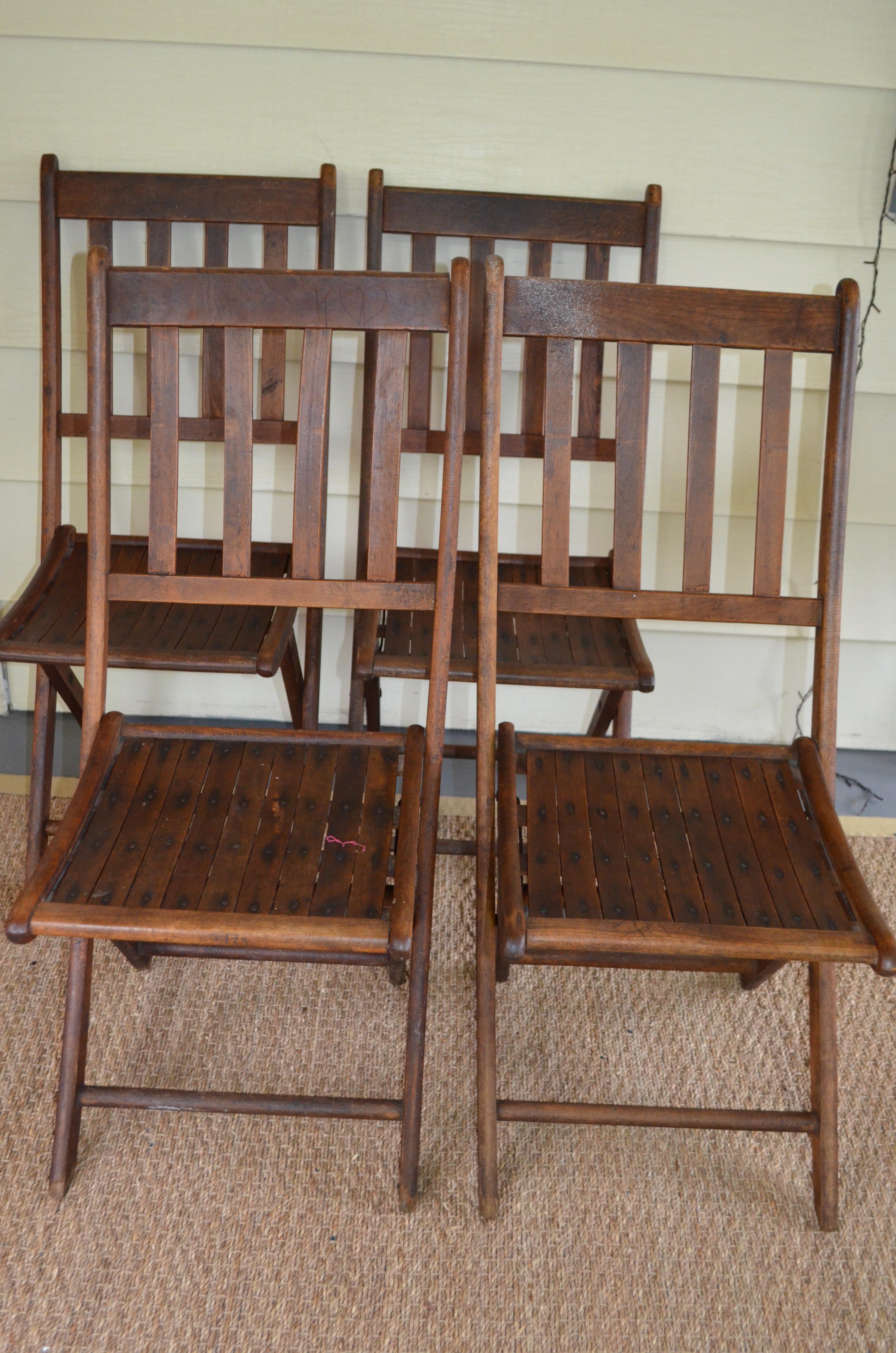 Folding chairs of oak that date to the 1890s. Clean-lined in their simplicity. People were smaller then, of course. These chairs will best-accommodate weights up to 240 pounds. The folding aspect of the chairs make them ideal for special events,