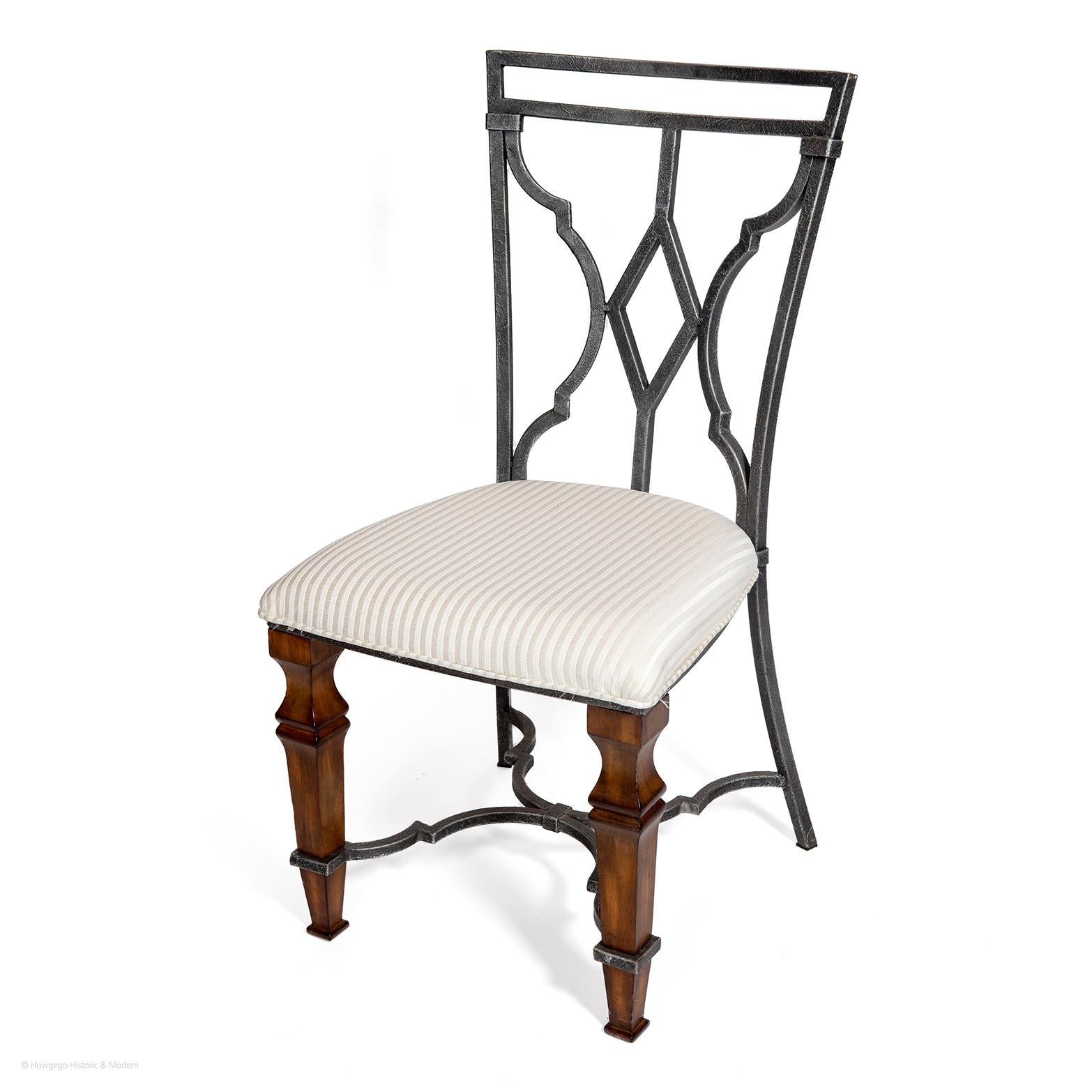 - Unusual set of chairs combining teak and metalwork upholstered in white striped textile
just purchased more information to follow and on request

Measures: Height (back) - 100cm 
Height (seat) - 49cm 
Depth - 46cm
Width - 55cm.