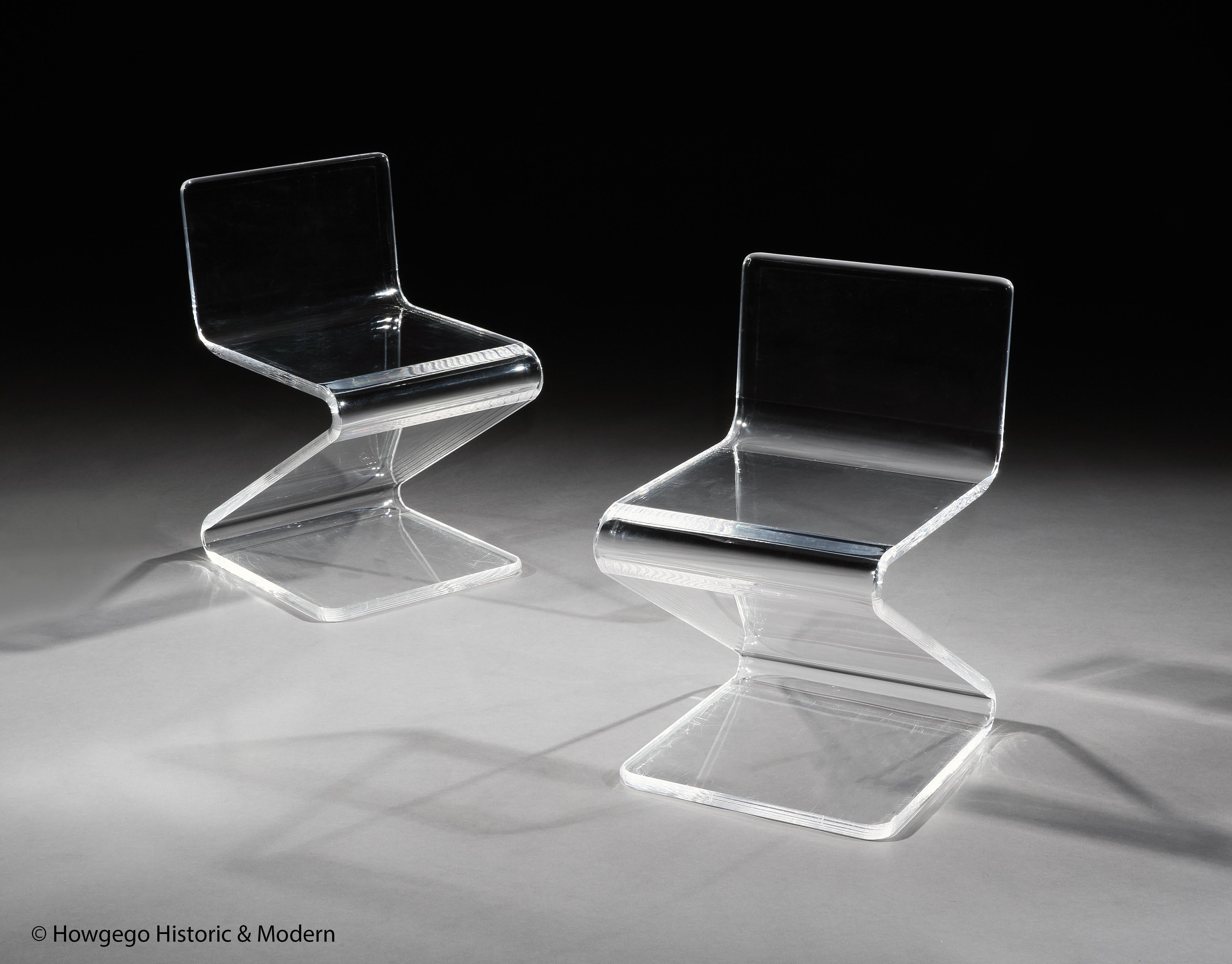A PAIR OF VINTAGE, LUCITE OR PLEXIGLASS, CANTILEVER, ‘Z’ CHAIRS
- Stylish minimalist design with distinctive low backs creating suitability for different functions: seating, occasional tables or display stands
- Each chair is cut from a single