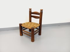 Chaise basse brutaliste Charles Dudouyt vintage en bois et paille