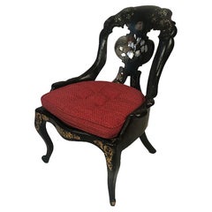 Chaise gondole Napoléon III en bois et papier mâché laqué noir et burgauté