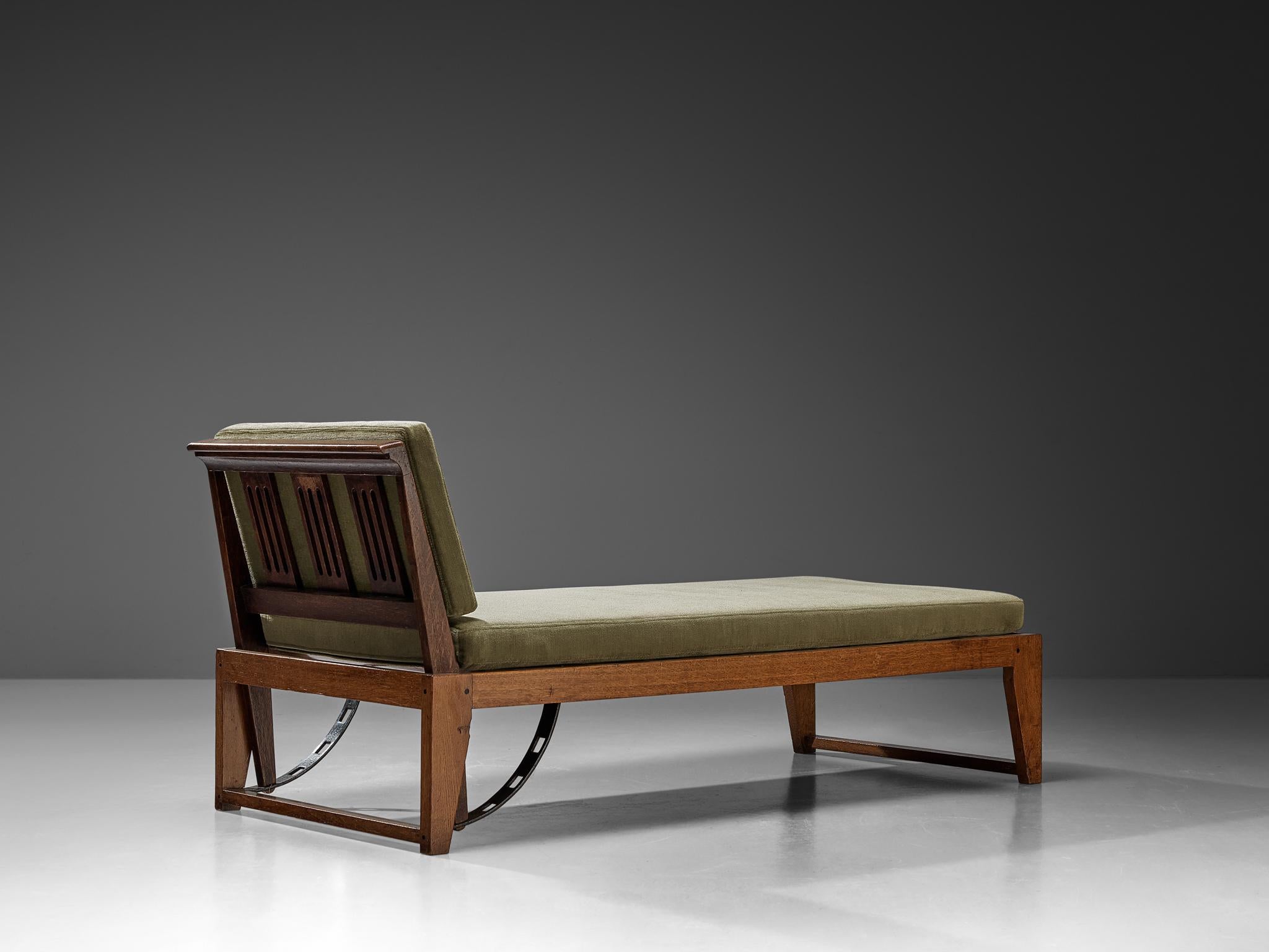 Chaise longue or daybed, fabric, oak, metal, Europe, 1950s

An adjustable lounge chair featuring an innovative mechanism, this piece exemplifies exceptional craftsmanship and distinguished design. The position of the backrest can be adjusted to