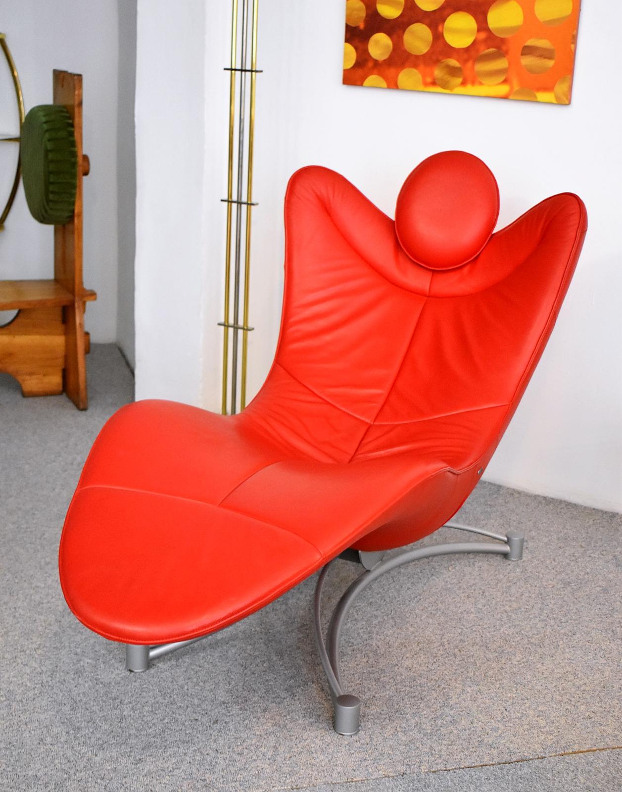 Designer chaise longue by De Sede model DS 151. Designed by Jane Worthington circa 2009. Red leather upholstery with polished steel base.

