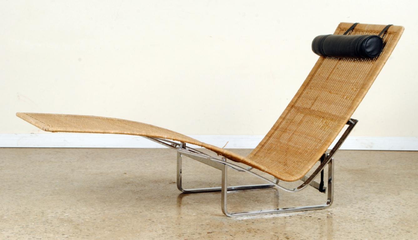 Poul Kjærholm PK24 chaise lounge. Polished stainless steel and rattan, Denmark, 1970s.