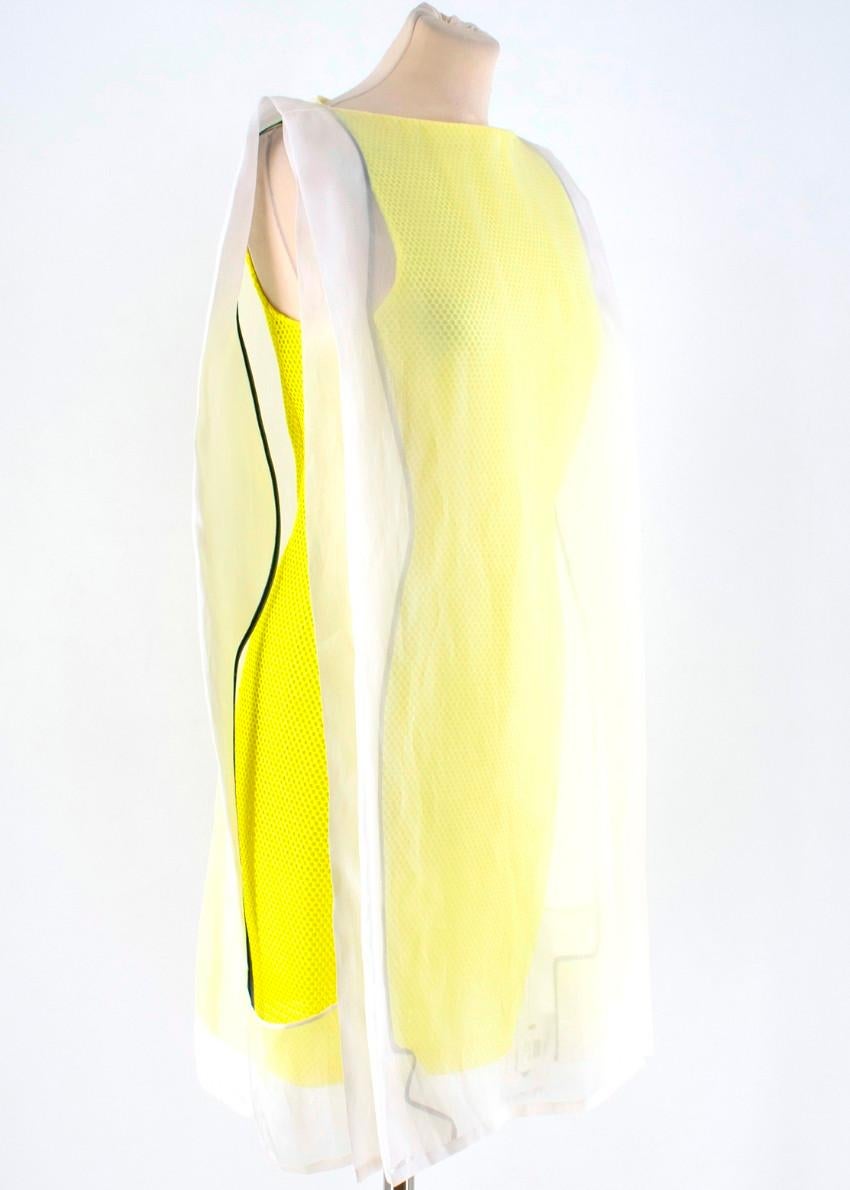 Chalayan Pop Lemon Double Layer Mini Frame Dress

- Yellow double layer mini frame dress
- Honeycomb mesh
- Ivory organza front and back overlay, contrasting black binding
- Crew neckline
- Sleeveless
- Centre-back hook-and-eye and zip fastening
-