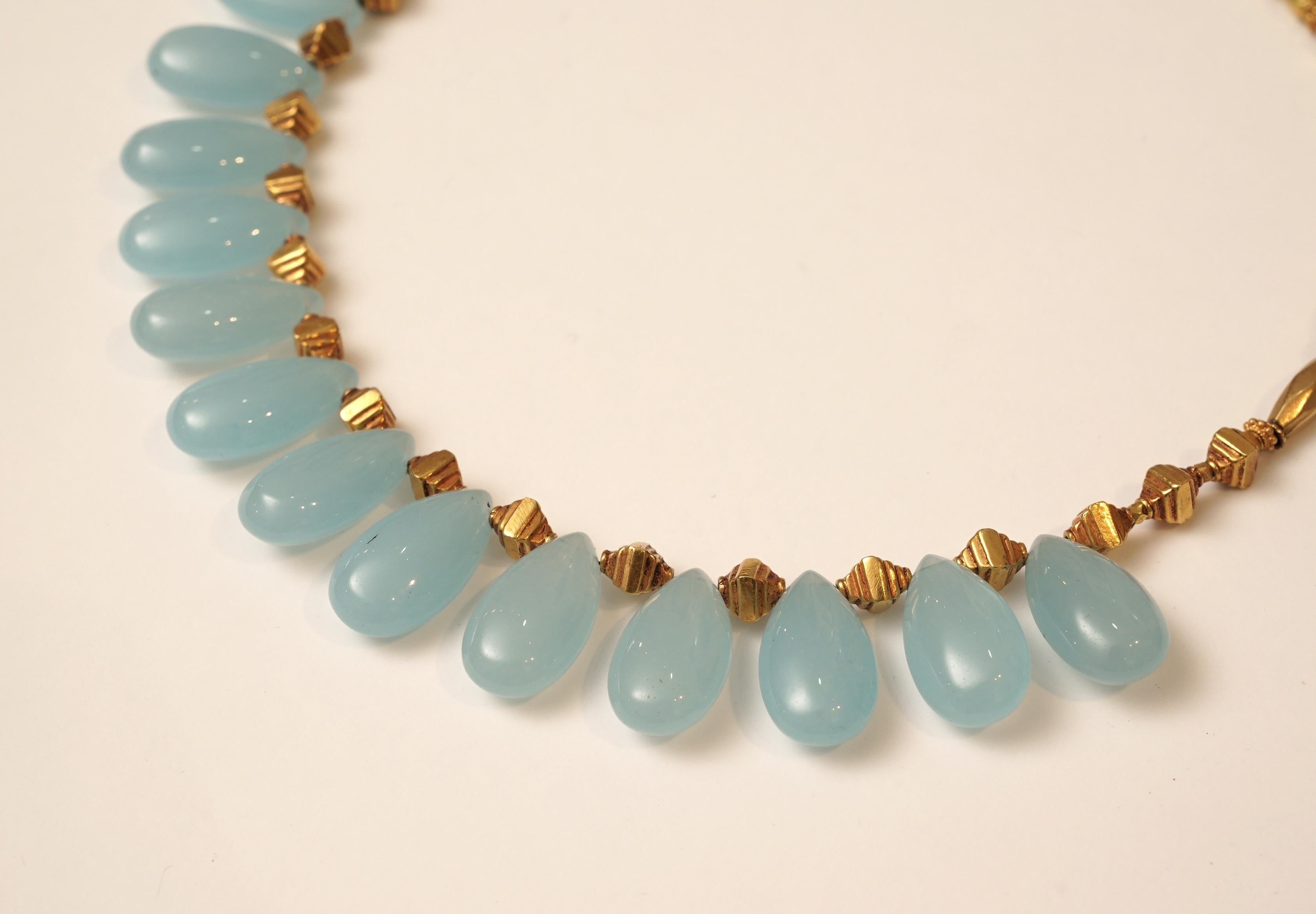 light blue and gold necklace