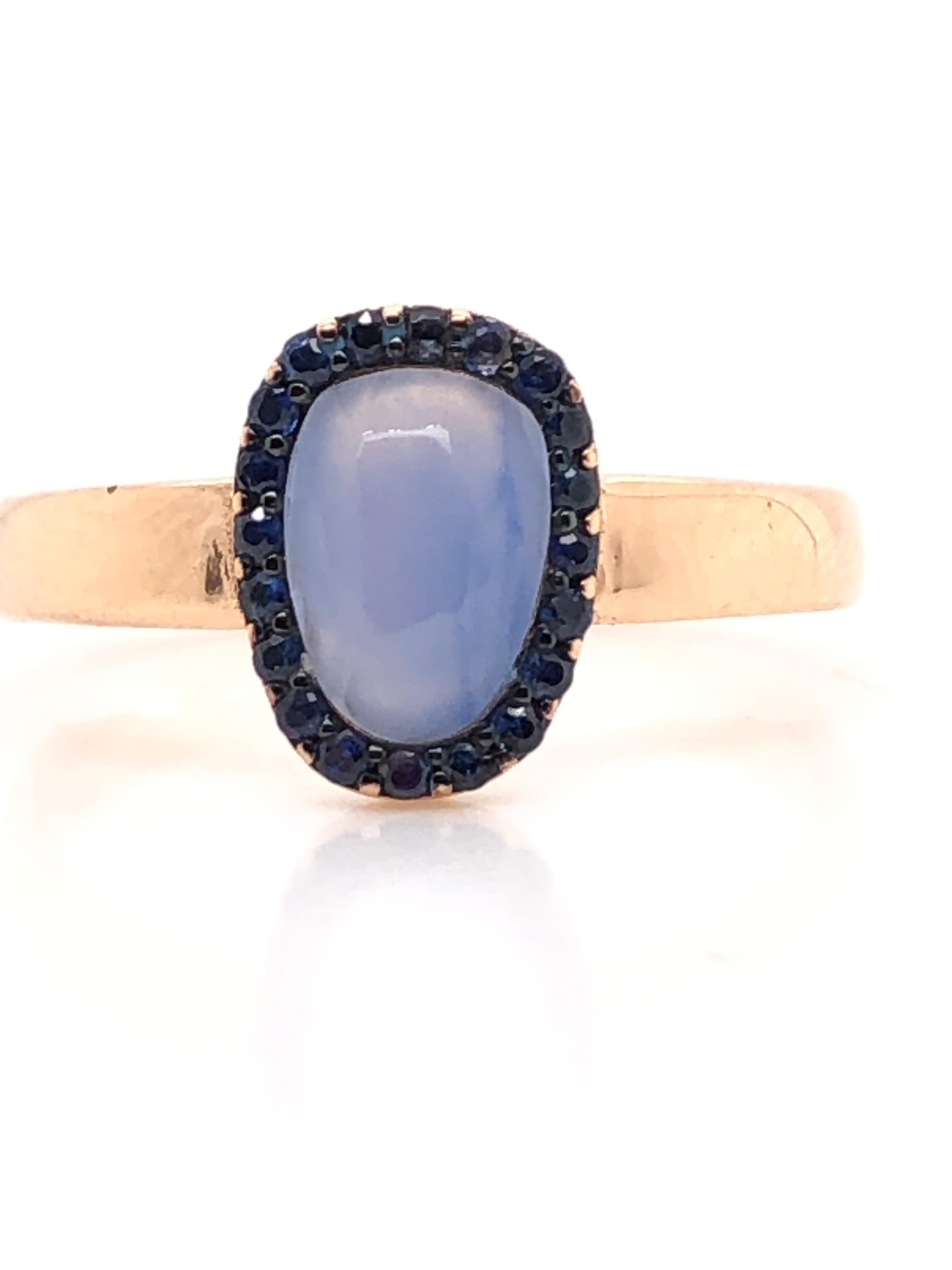 Calcedony and Blue Sapphire on Rose Gold 18 k Ring
Chalcedony Cabochon Shape
Blue Sapphire 0.16 ct
French Size : 53
Us Size : 6 3/4
British Size :  M
Weight Of Gold : 3.05 Grams

