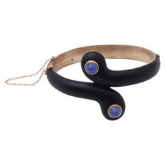 Chalcedony black enamel bangle bracelet in 14 karat gold