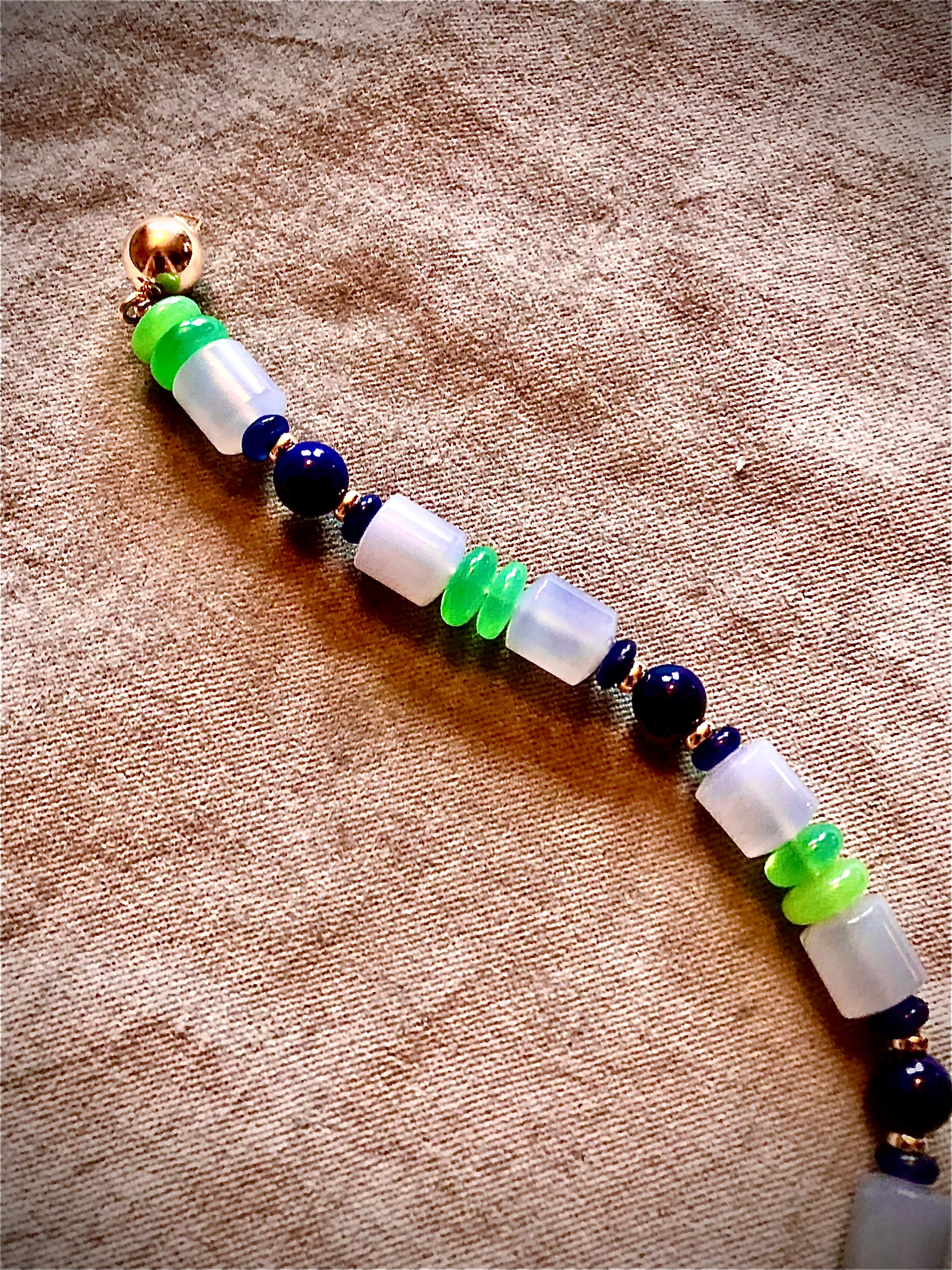 A necklace Nefertiti might have admired. This chic single strand piece features the most prized gem of ancient Egypt, rich blue lapis lazuli. The lapis beads are flanked by 14kt gold smooth rondelles which are in turn are set off with blue sapphire
