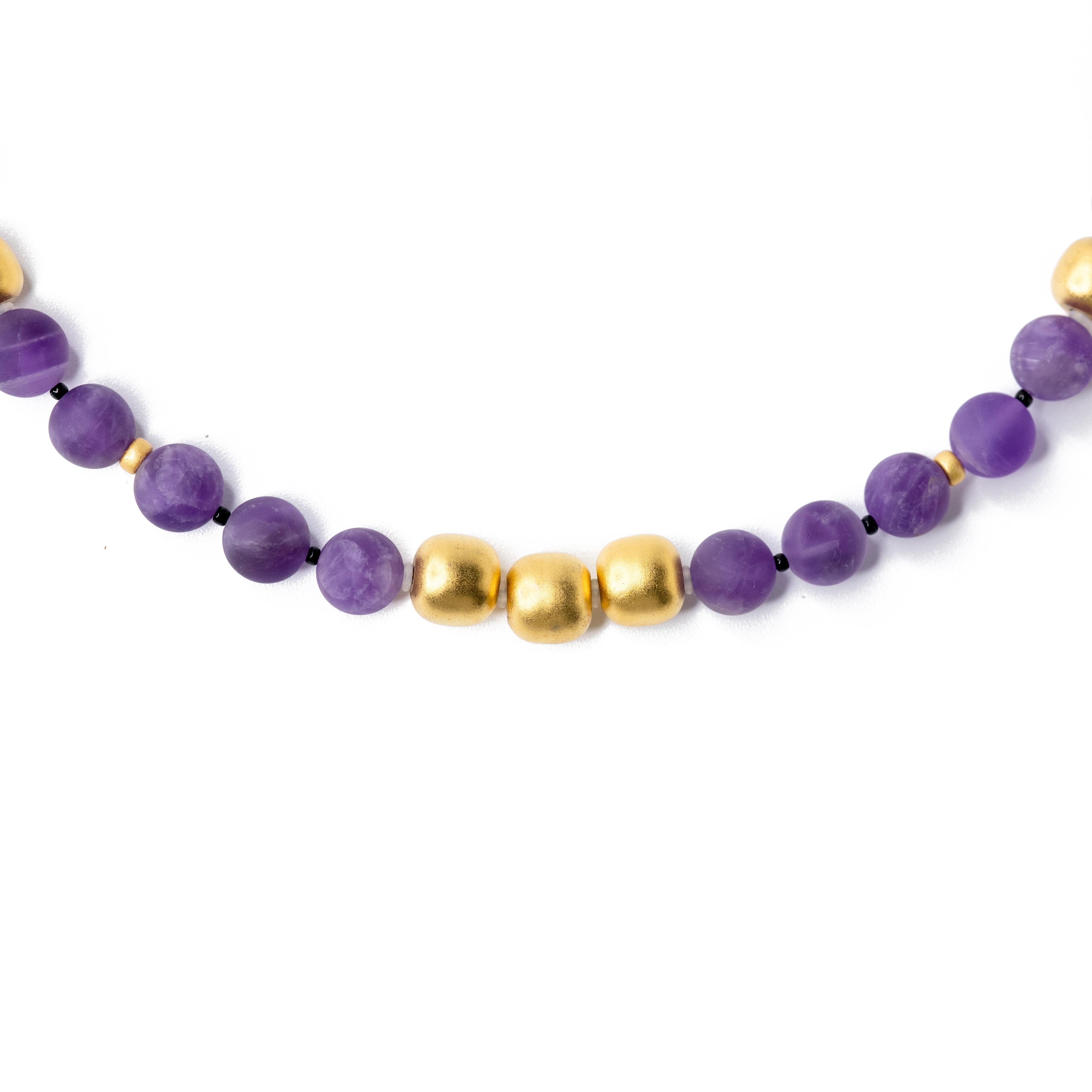 This necklace is crafted from Amethyst Crystal Beads, and Gold Plated Brass Beads, inspired by artist Erin Hanson's Famous Painting 