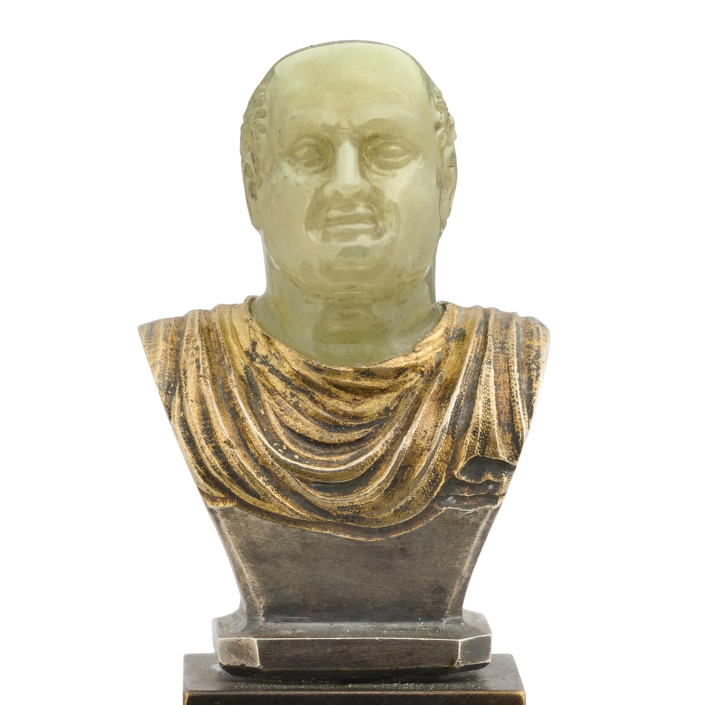 Chalcedony and Silver-Gilt Bust of the Emperor Vespasian.

Italy, 17th–18th century.

Measurements
Height overall: 11 cm
Height of bust: 5 cm
Height of chalcedony head: 2.6 cm

Description
A refined small bust depicting the Roman Emperor Vespasian,