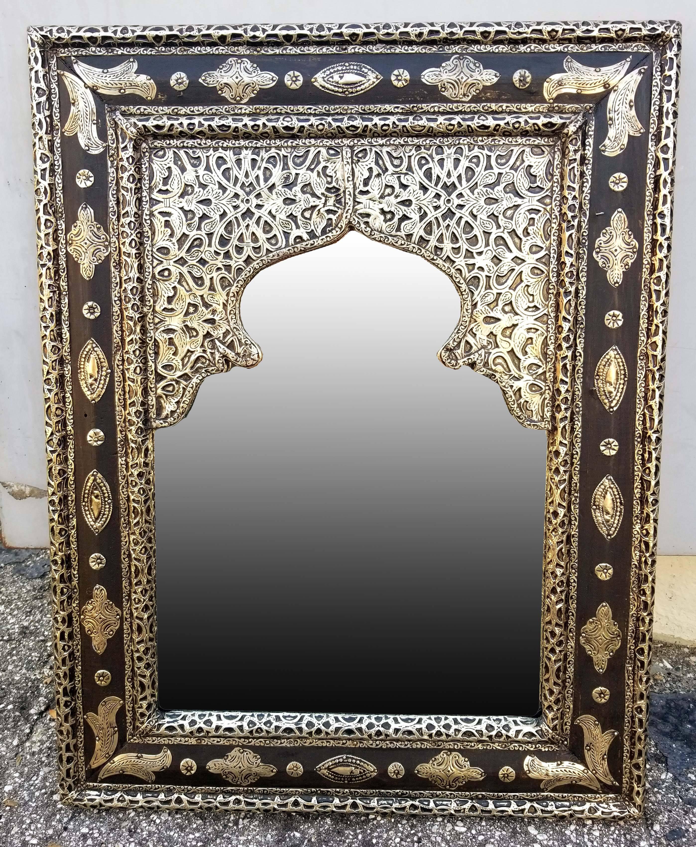 Large metal inlaid and camel bone Moroccan mirror. Made in the city of Marrakech. Rectangular shape measuring approximately 26