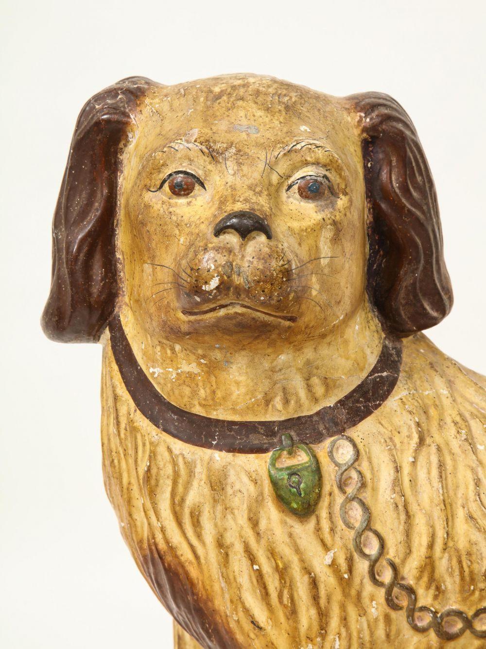 Charming figure of a spaniel cast from Staffordshire ceramic molds and handpainted in water-based pigments. Chalkware is made from plaster of Paris and was used to create inexpensive versions of decorative objects.