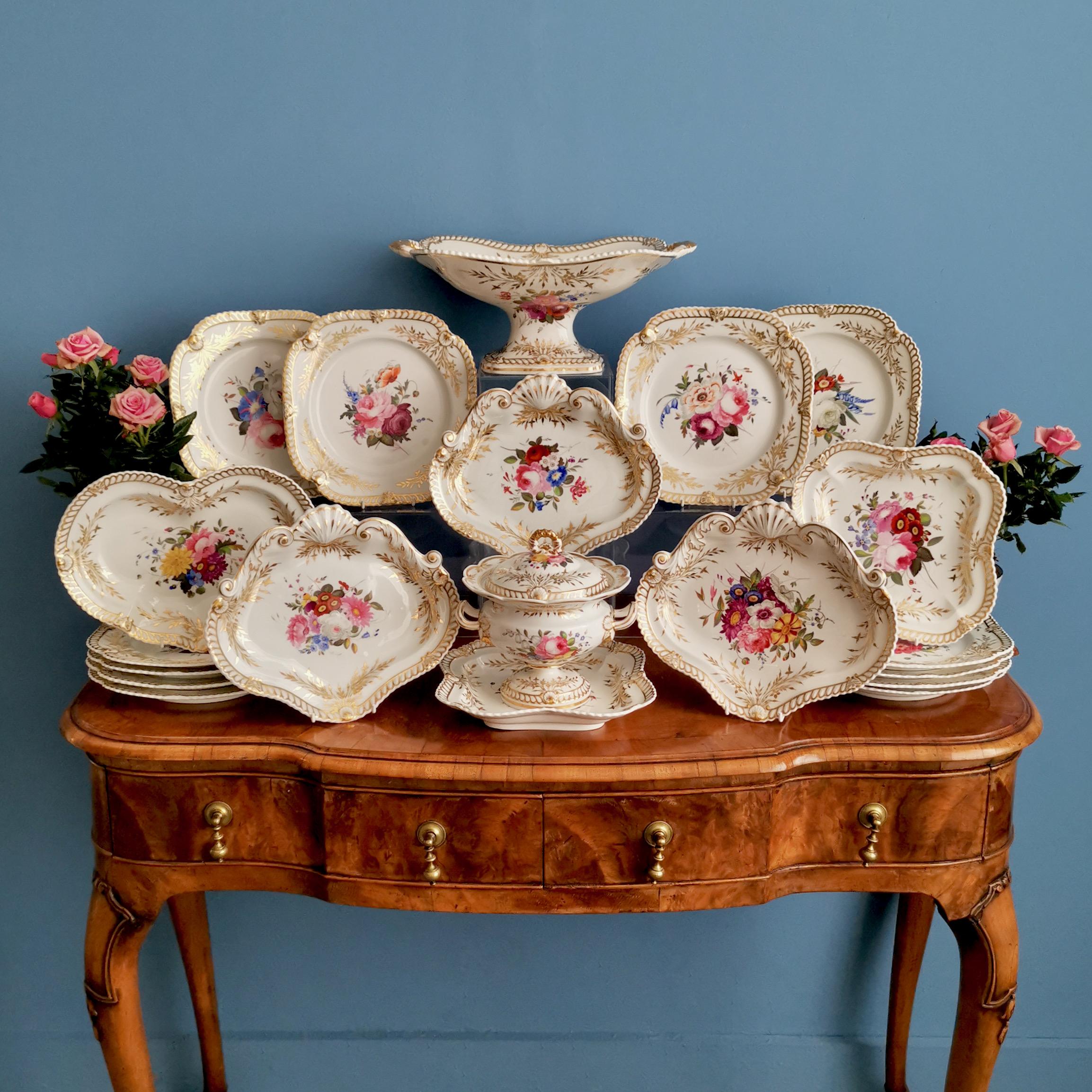 This is a spectacular and rare dessert service made by Chamberlains Worcester in about 1822. The service consists of a high comport, 2 square dishes, 1 kidney shaped dish, 3 shell dishes, one sauce comport with cover, and twelve square plates.

The