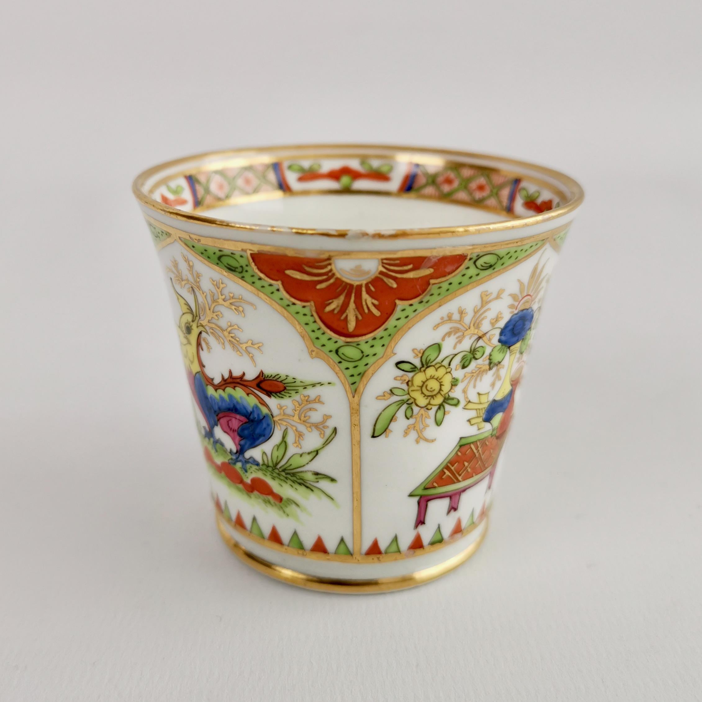 This is a super charming orphaned coffee cup made by Chamberlains in Worcester, circa 1810. The cup is decorated with the famous 