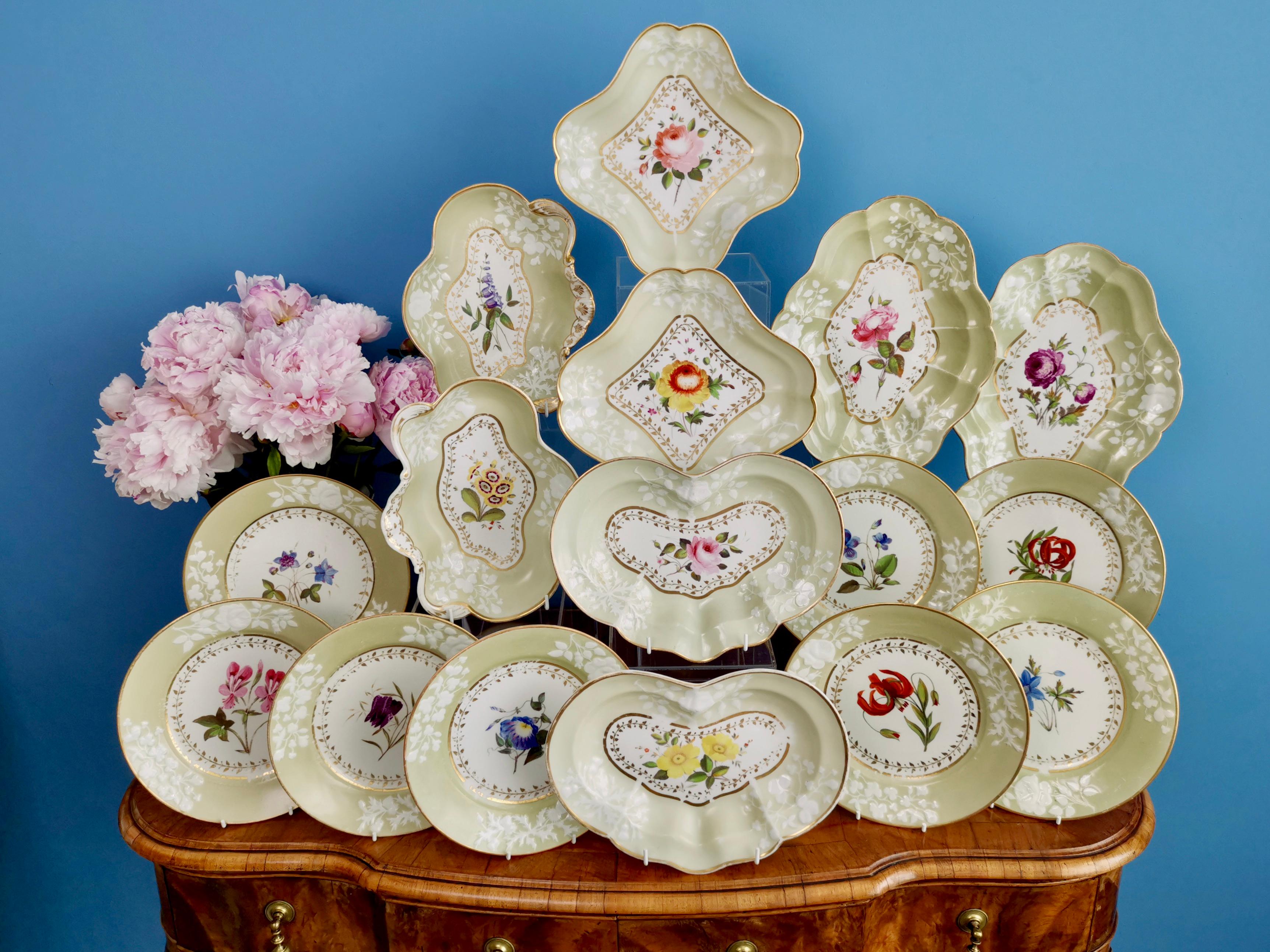 This is a stunning dessert service made by Chamberlains Worcester between 1816 and 1820. The service consists of two big lozenge shape dishes, two square dishes, two kidney shaped dishes, two leaf shaped dishes, and eight plates. The service has the