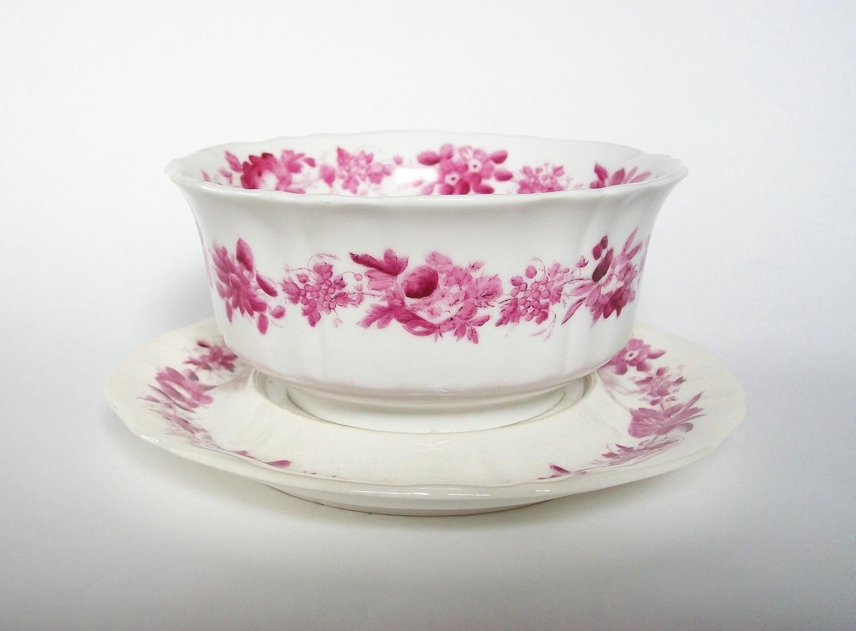 CHAMBERLAIN'S WORCESTER - Rare ceramic serving bowl on stand - transfer decorated in pink with floral borders and sprays featuring roses and passion fruit flowers - hand painted highlights - 1230 painted pattern mark to both pieces - impressed