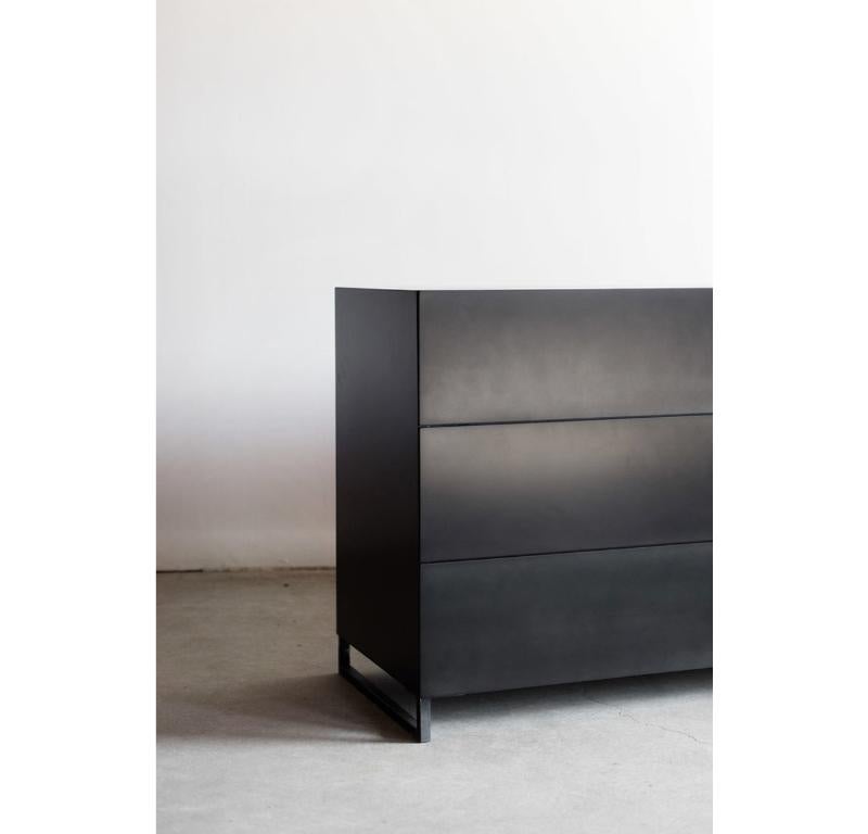 This Chambers Dresser is Custom Made in Los Angeles. Sheered, sheet metal casing is attached to plywood substrate. Drawers are built and fit to size. 

Industrial Steel + Birch Interior
Poly Finish

For all furniture, protection from heat and