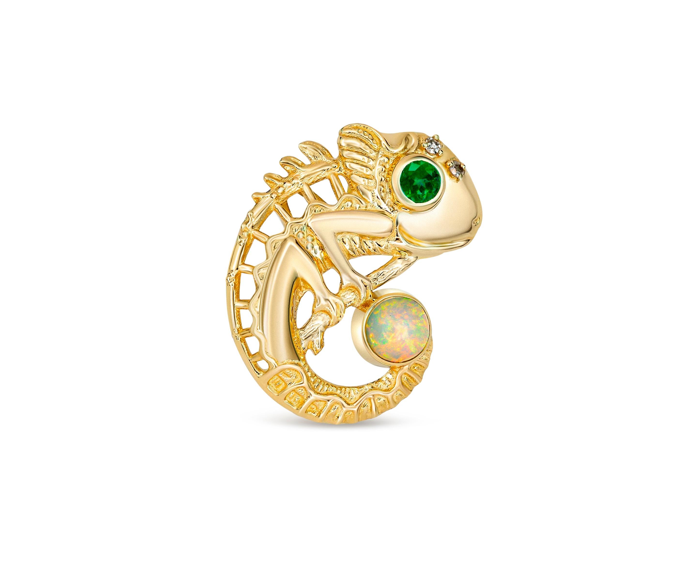 Chameleon pendant with opal, emerald and diamonds in 14k Gold. 
Reptile gold Charm. Gold Lizard pendant. Animal, Wildlife gold pendant.

Metal: 14k gold
19.3x13.5 mm size
Weight 2.00 gr

Gemstones:
Opal: round cabochon shape, orange-yellow with