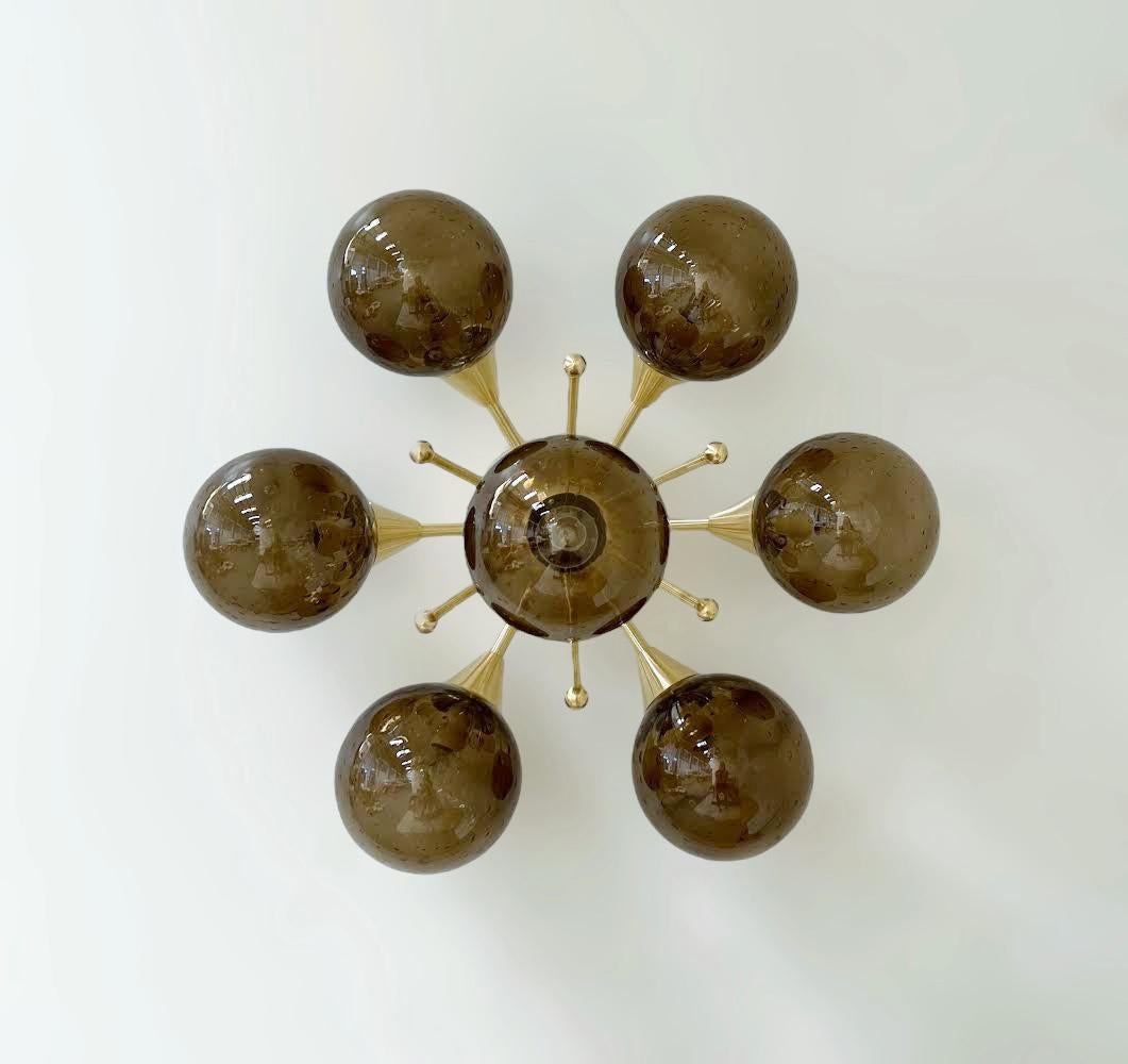 Italian flush mount with Murano glass globes mounted on solid brass frame 
Designed by Fabio Bergomi / Made in Italy 
7 lights / E12 or E14 type / max 40W each 
Diameter: 25.5 inches / Height: 13 inches 
Order only / This item ships from Italy