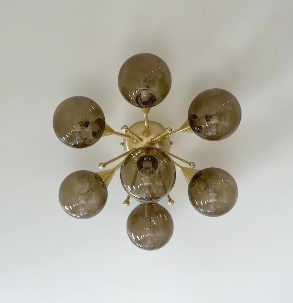 Italian flush mount with Murano glass globes mounted on solid brass frame 
Designed by Fabio Bergomi / Made in Italy 
7 lights / E12 or E14 type / max 40W each 
Diameter: 25.5 inches / Height: 13 inches 
Order only / This item ships from Italy