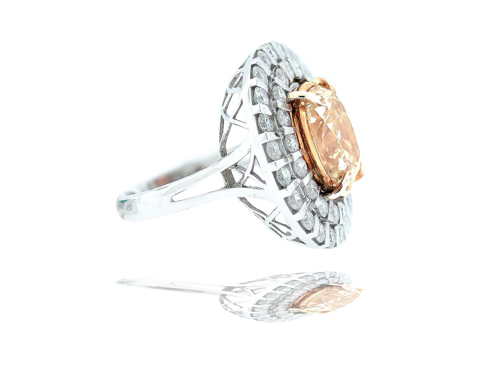 Champagne, 8.25 CTW Cocktail Diamond Ring
Amazing ring consists of a center 6.77 carat oval shaped center diamond which is champagne colored. The setting consists of a double row of diamonds surrounding and measuring  1-1/8 