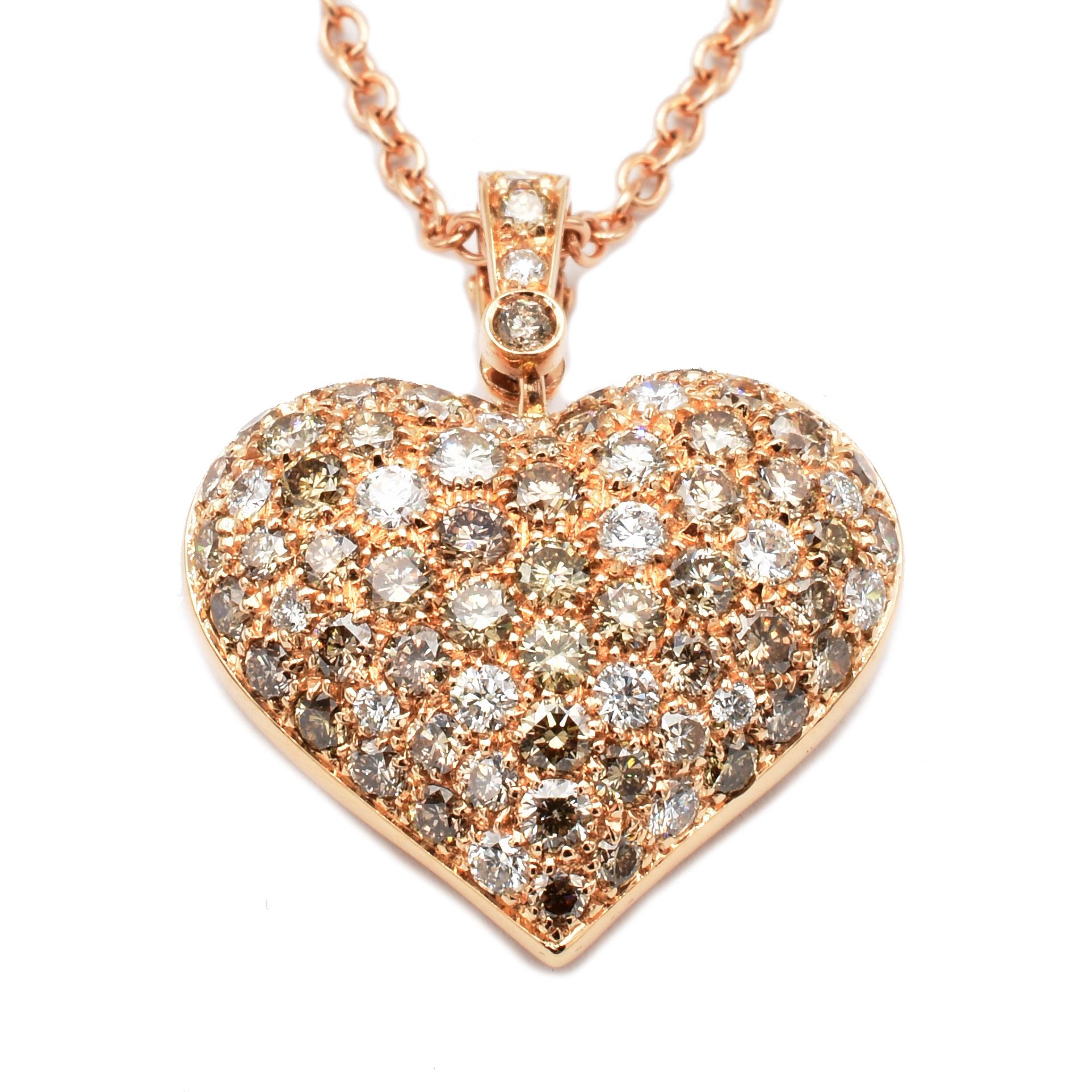 18Kt Rose Gold Heart Pendant Necklace with a mix of Champagne Diamonds (80%) and White Diamonds (20%).
Handmade in Italy in Our Atelier in Valenza (AL).
18Kt Gold g 9.70
Champagne Diamonds ct 1.26
G Color Vs Clarity White Diamonds ct 0.48
Beautiful