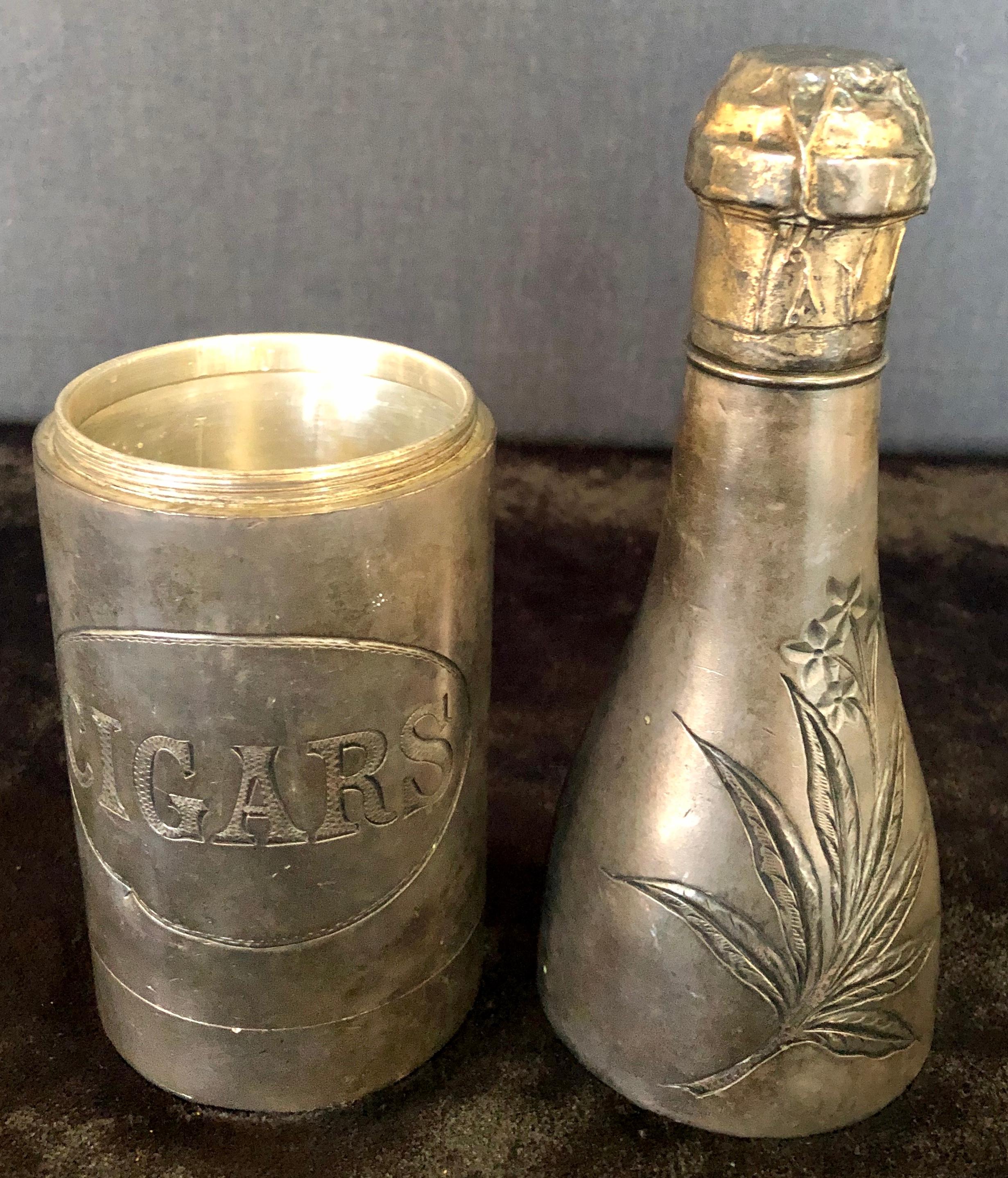 Early 20th Century Champagne Bottle Cigar Holder Pairpoint Manufacturing.Co. Part of a Large Collec