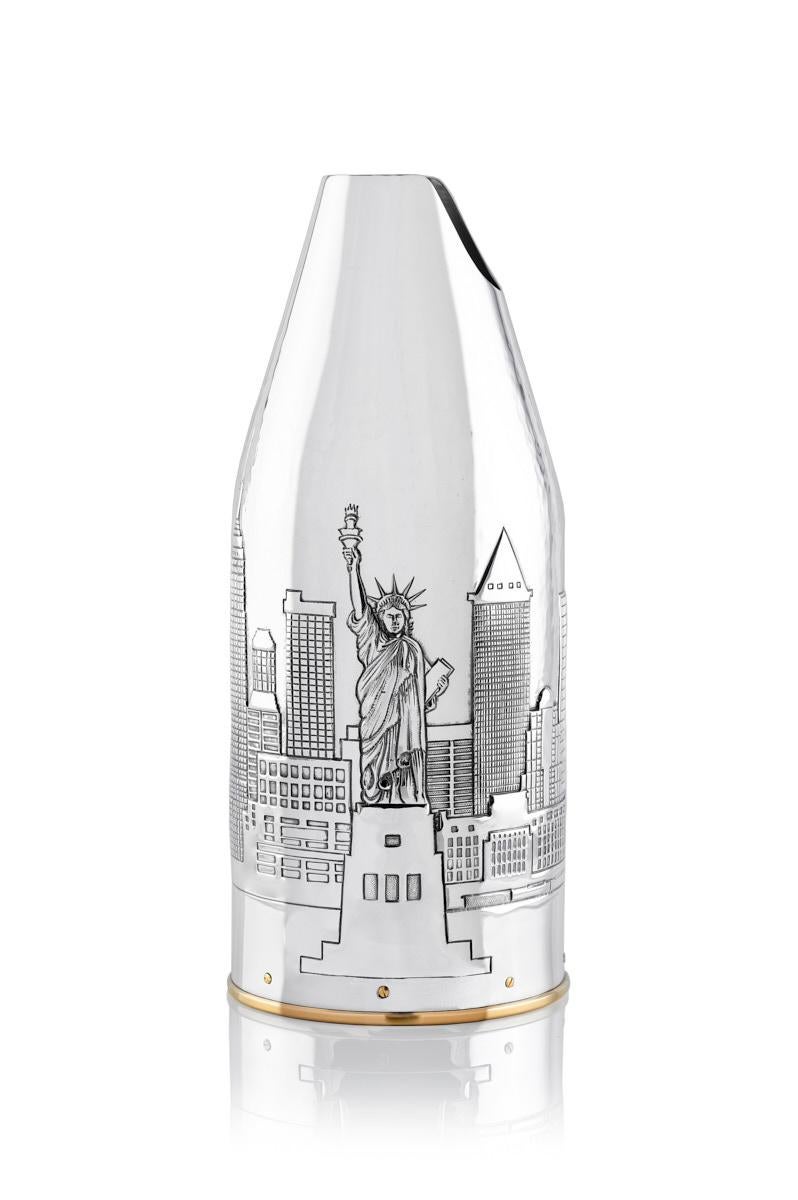 Introducing a distinguished piece from our K-OVER Works of Art Colleciton, New York a 999/°° pure silver champagne bottle cover, masterfully inspired by the New York skyline. This innovative design captures the essence of the city that never sleep,
