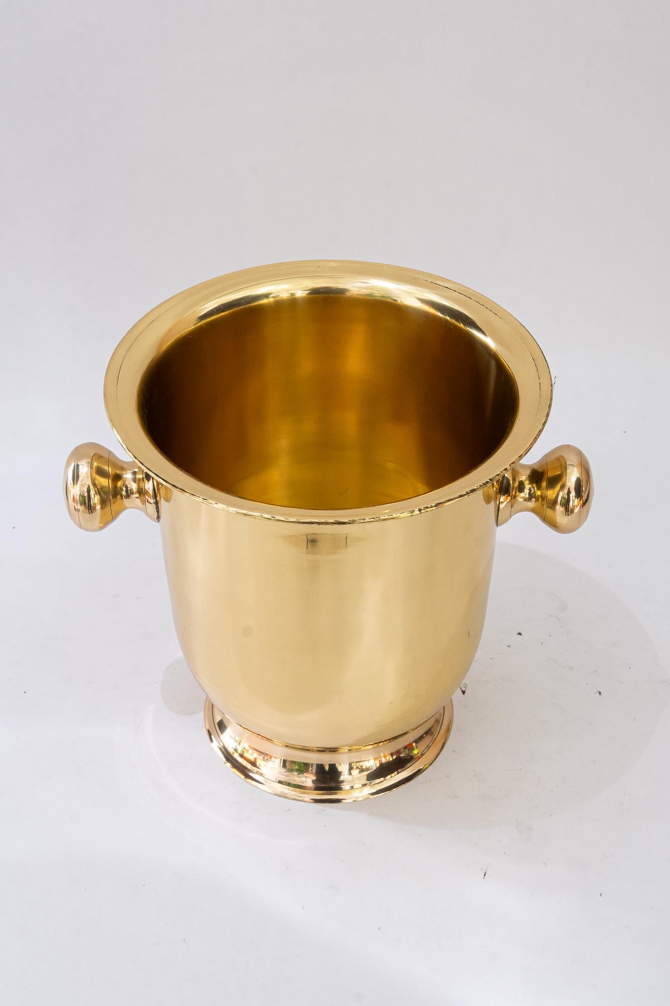 Cubo de champán hacia 1920
Latón pulido y esmaltado al horno