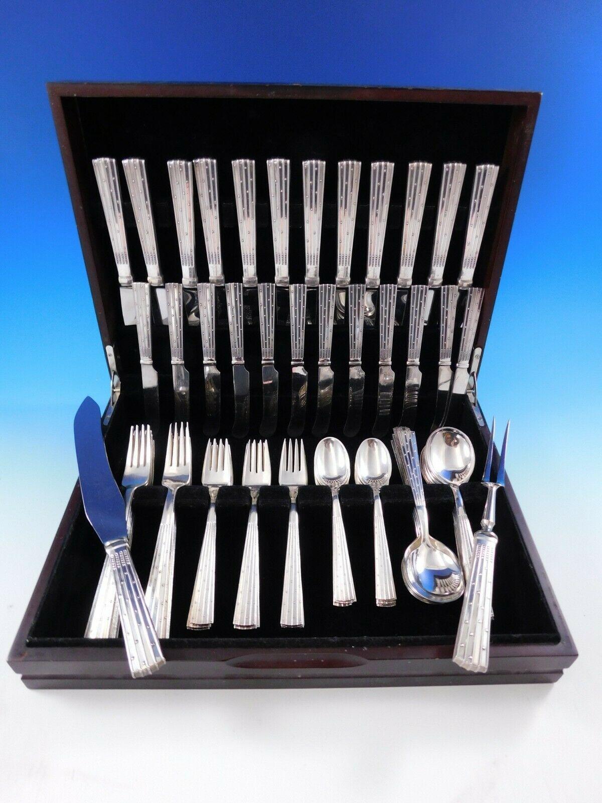 Mid-Century Modern Champagne by Mogensen Danish sterling silver Flatware set, 74 pieces. The handle design resembles modernist interpretation of a glass of champagne with tiny bubbles.
 
Renowned silversmith Mogensen was a silversmith in Denmark