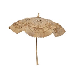 Champagne-coloured embroidered silk sun umbrella with embossed flowers