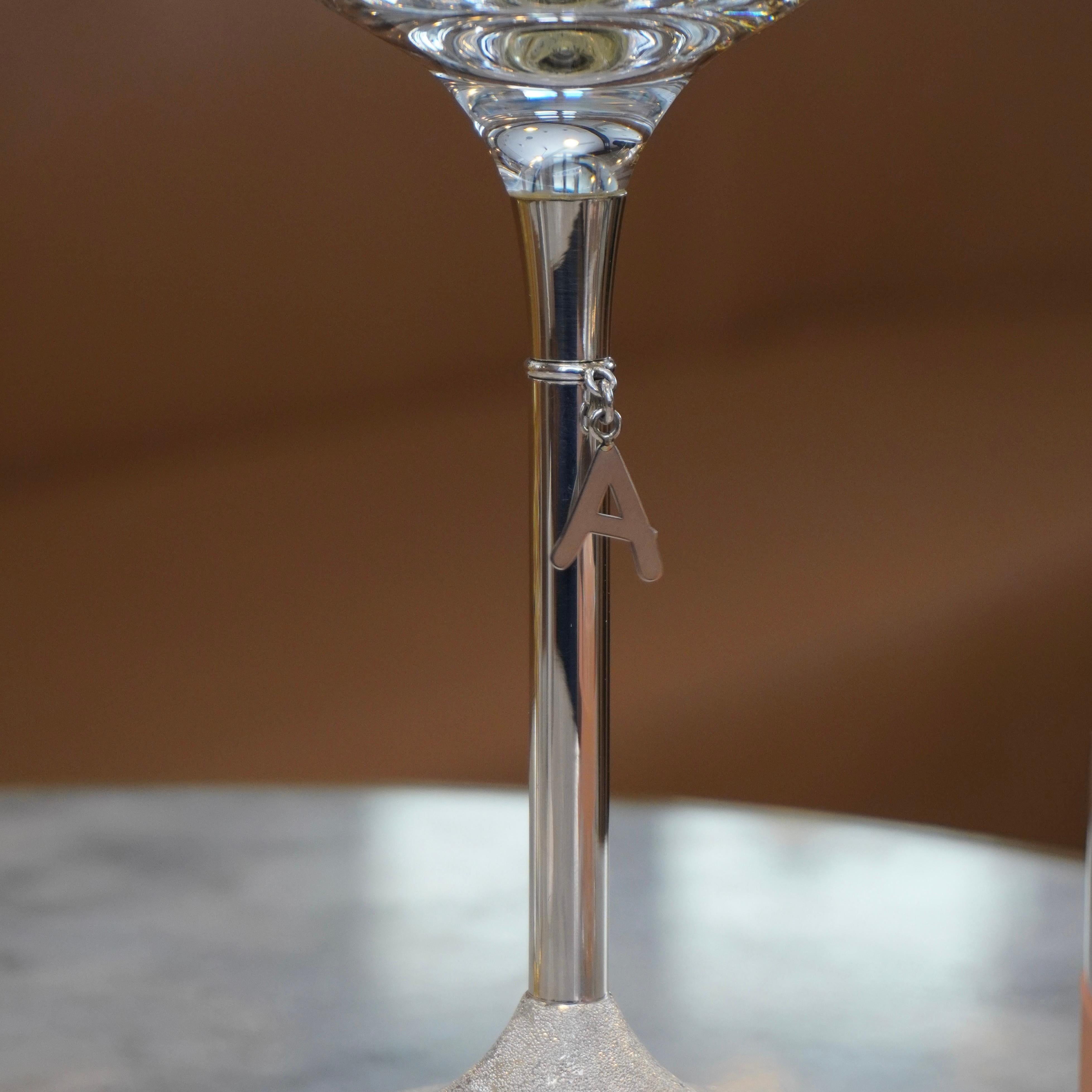 K-OVER’s latest creation, the diamond-cut silver stem champagne coupe glasses, flawlessly combines elegance and practicality. Available for purchase individually or in pairs, these exquisite glasses are perfect for special moments like weddings,