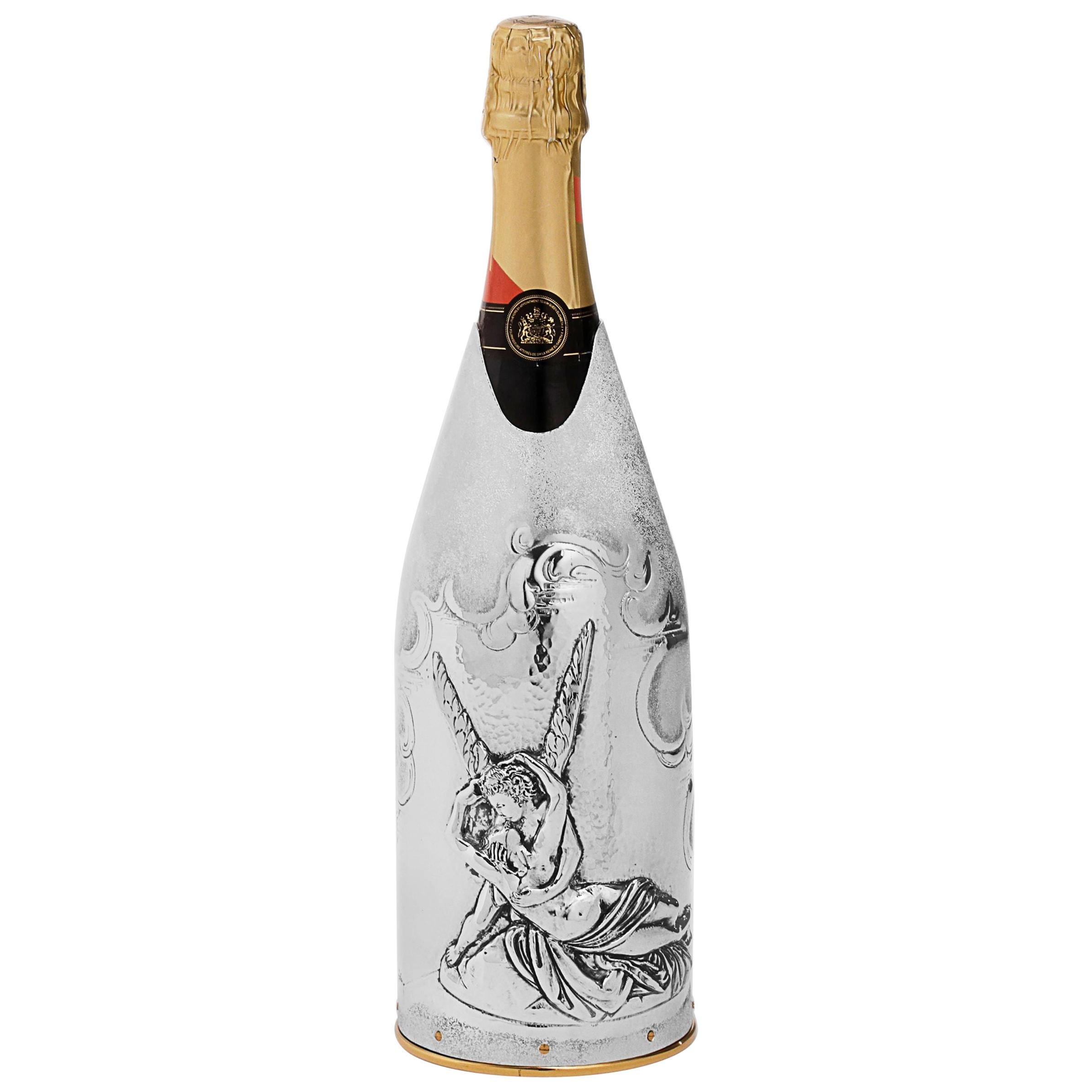 This champagne cover belongs to the collection “K-over Art”. The subject of our pure silver 999/°° K-OVER is “Amore e Psiche”, one of the most famous sculpture of Antonio Canova. The cover was designed to celebrate love. As a matter of fact, the