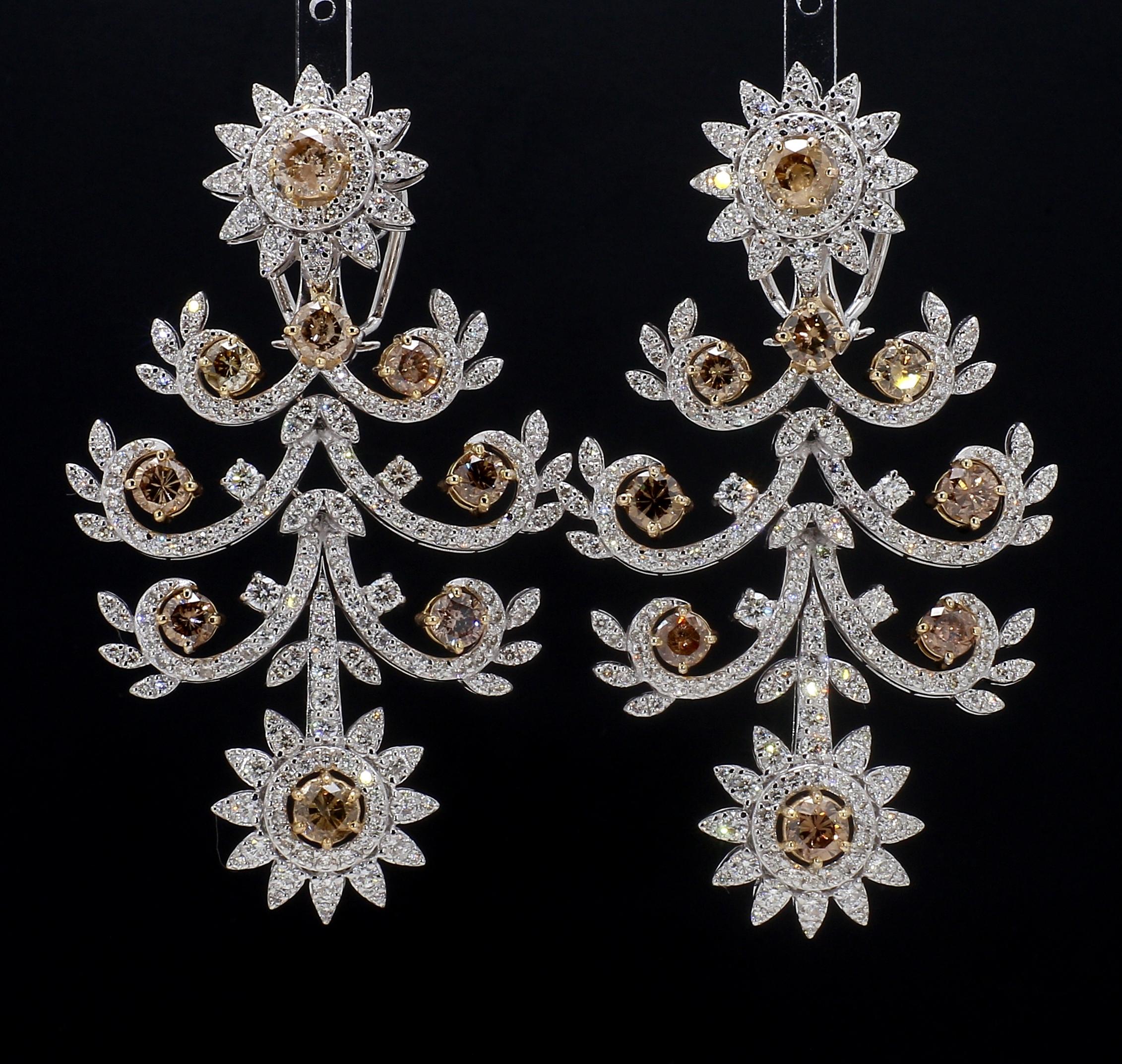 **All jewellery is one-of-a-kind**
**Hallmarked with diamond weight and gold purity**

Add some glamour to your look with these stunning Champagne Diamond Chandelier Earrings from Alternative Jewellery. These earrings feature a unique design with