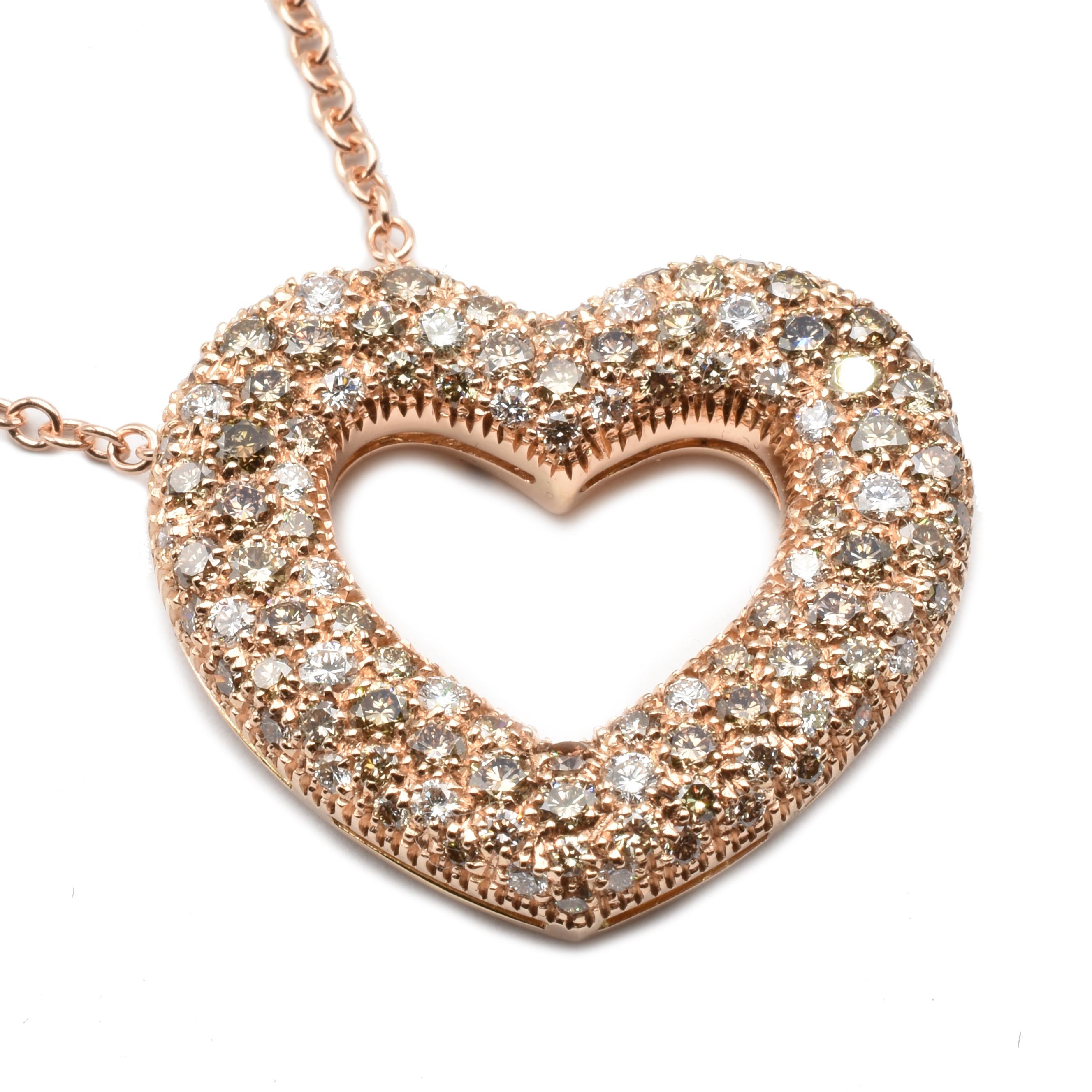 18Kt Rose Gold Heart Pendant Necklace with a mix of Champagne Diamonds (80%) and White Diamonds (20%)
Handmade in Italy in Our Atelier in Valenza (AL)
French Settings. 
18Kt Gold g 12.70
Champagne Diamonds ct 1.99
G Color Vs Clarity White Diamonds