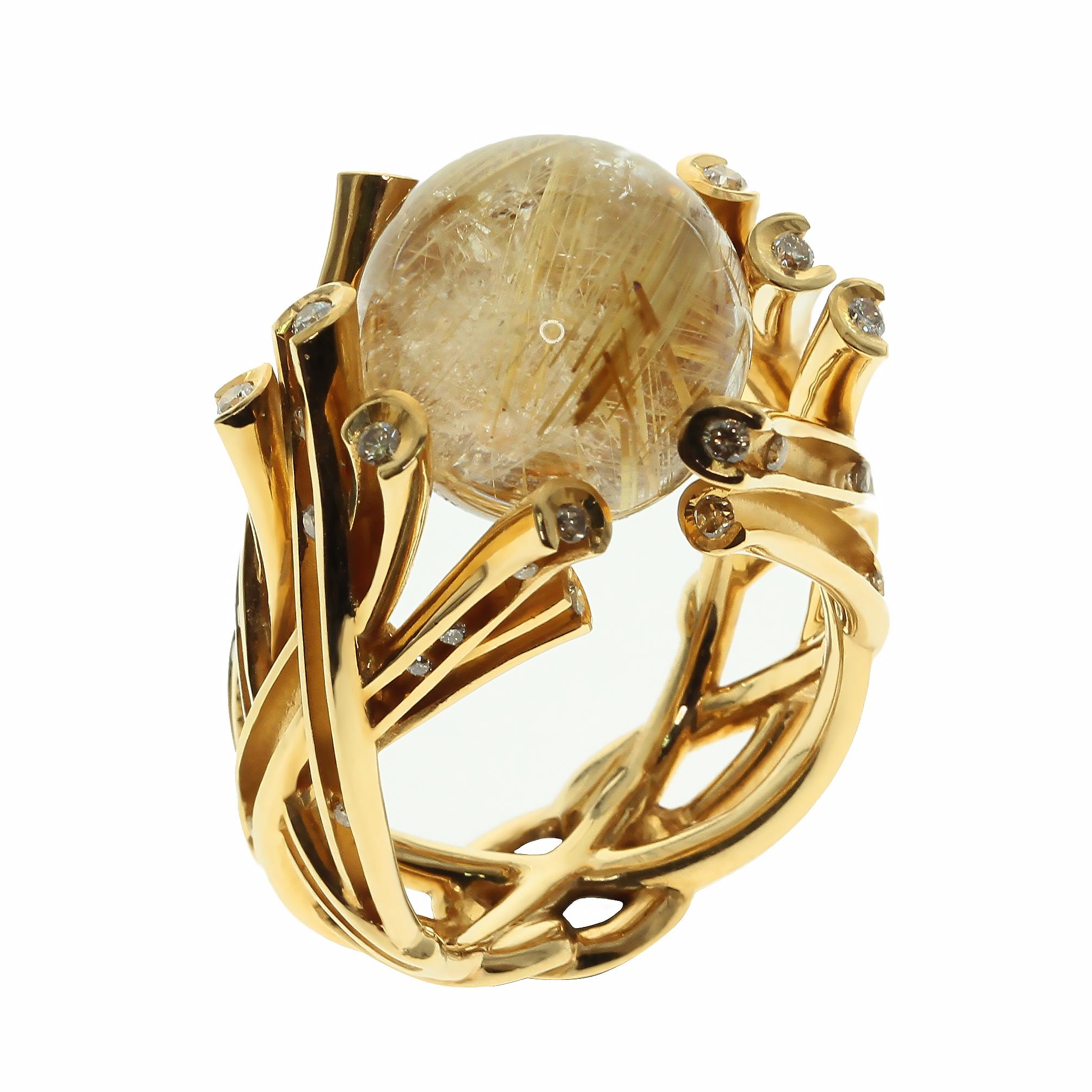 Champagne Diamonds, 15.64 Carat Rutilated Quartz, 18 Karat Yellow Gold Ring
Our designers draw inspiration from everywhere. Also is here. What is interesting in brushwood? And you just imagine how this 15.64 Ct Rutilated Quartz endows these dead