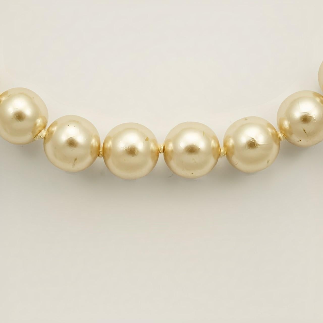 Round Cut Champagne Glass Pearl Necklace with a Silver Tone and Rhinestone Clasp For Sale
