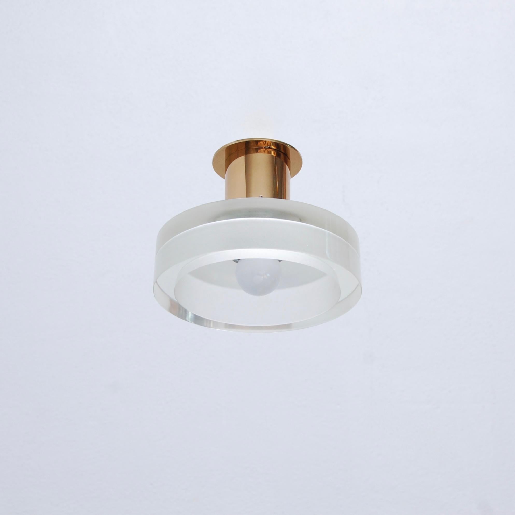 Single classical Seguso Ceiling fixture from mid century Italy in champagne color glass and brass. Partially restored. (1) E26 medium based socket. In brass and glass. Light bulb included. 
Measurements:
Height: 6.5”
Diameter: 8.75”.
   