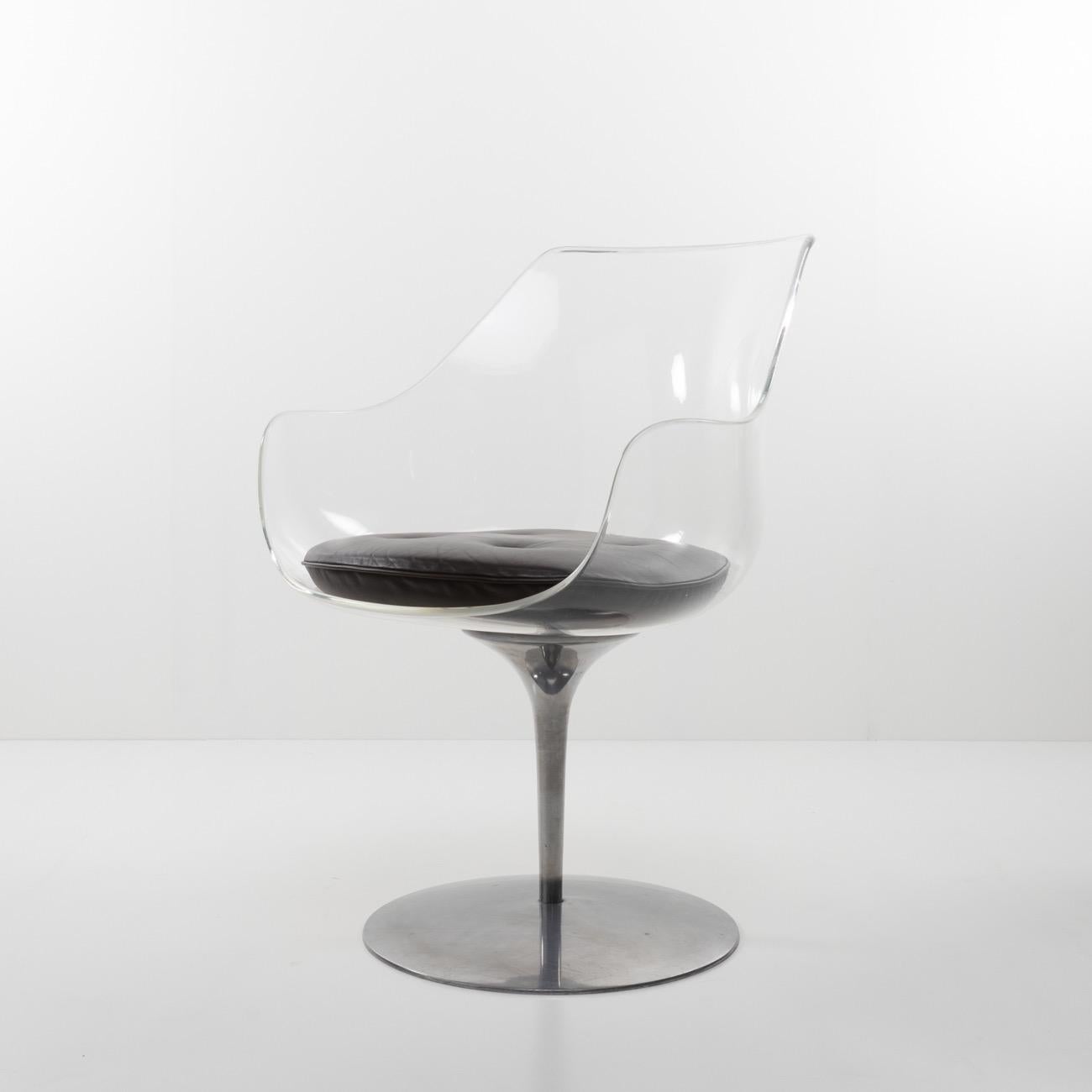 These chairs are made of acrylic glass and polished aluminium. Each one has a cushion covered in dark brown leather. 
Each example is signed under the base “MADE IN ITALY”, “Champagne Chair Laverne”, “FORMES NOUVELLES”. 
 
The set is in very good