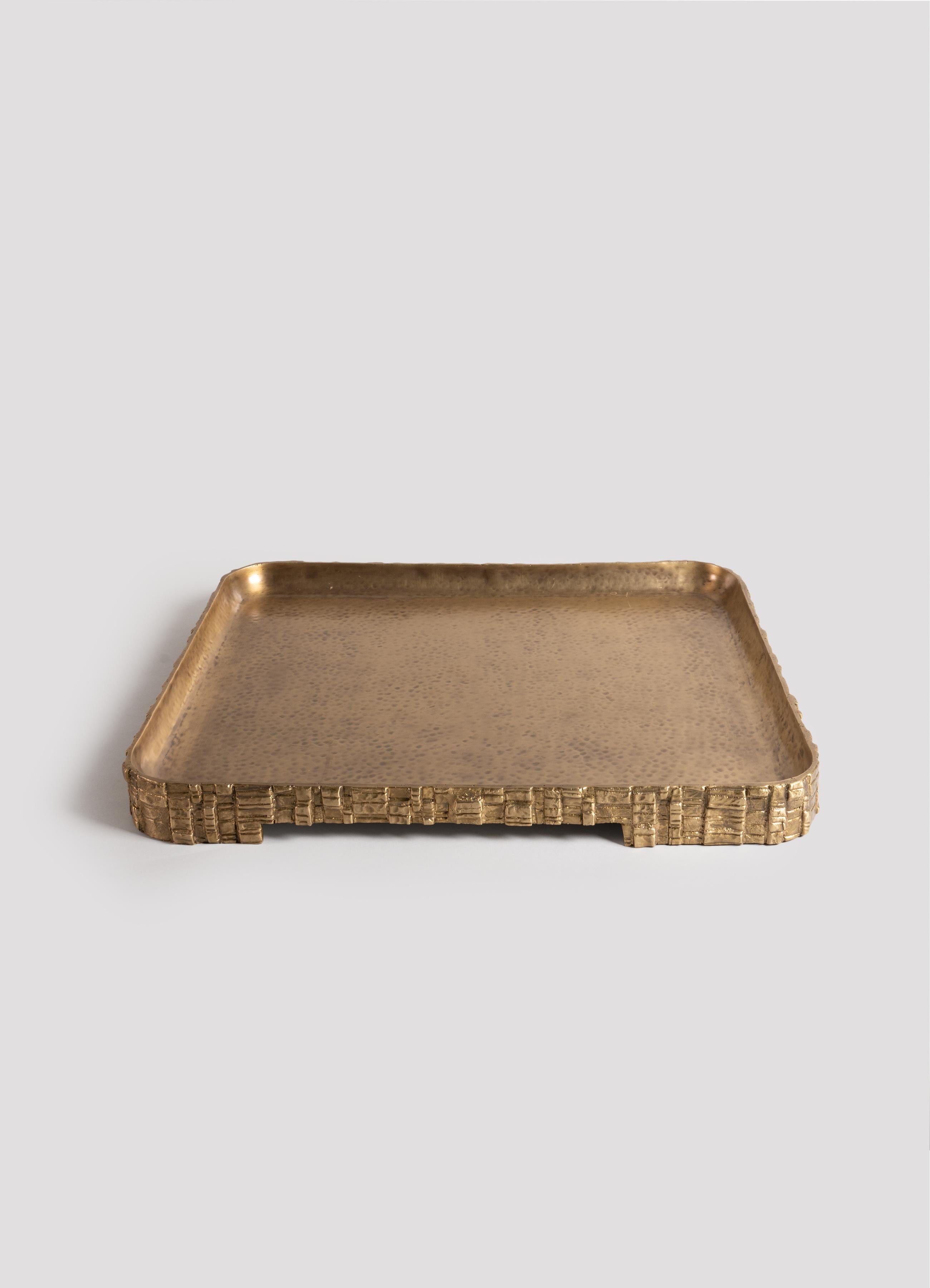 Champaner Tray Large in Brass, Viya by Vikram Goyal

The mystery of life is that one ends up left by going right, up by going down, and outwards by looking inwards. Simple in construction yet beguiling to observe, these stepwell-inspired objects are