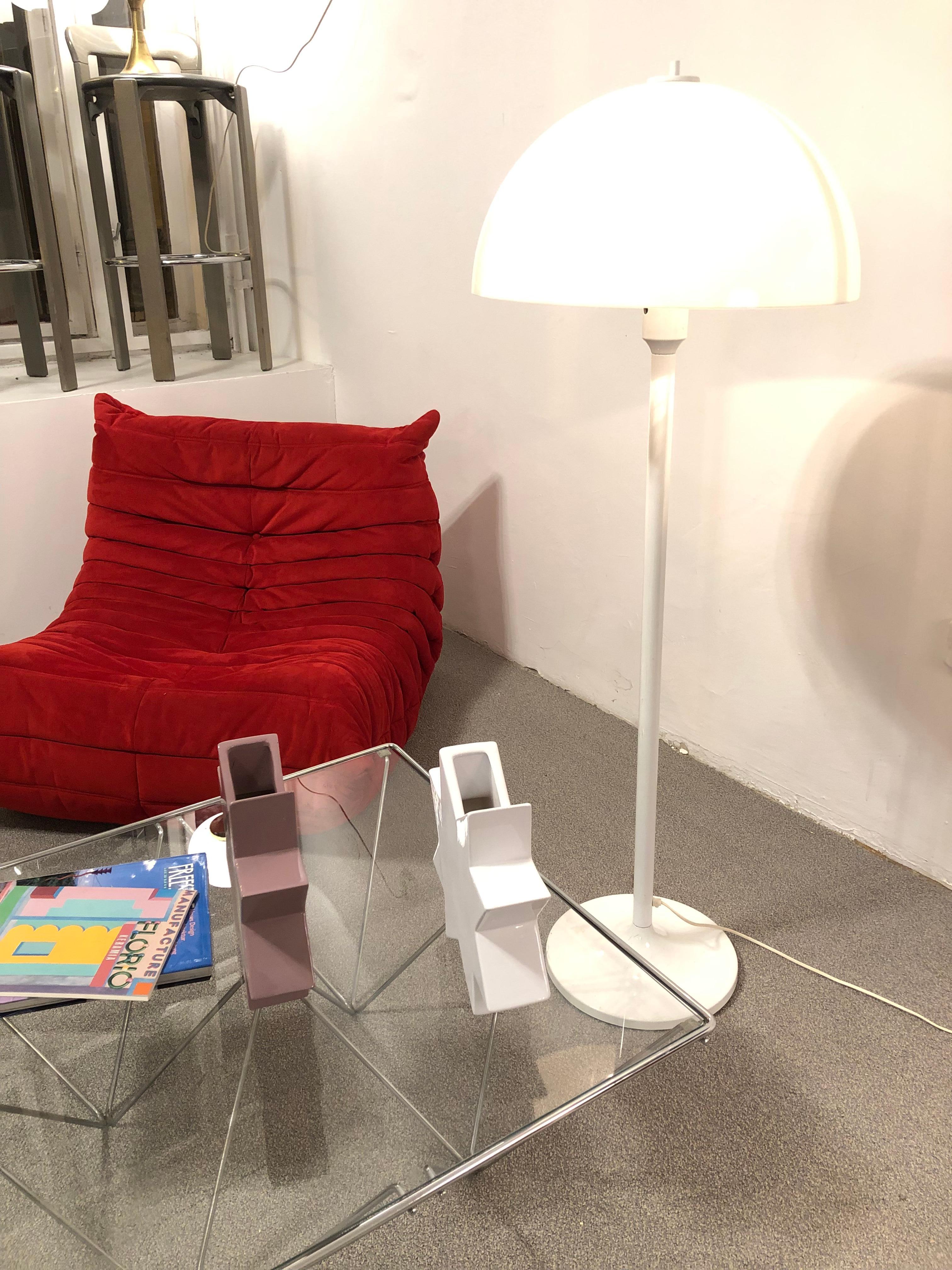 Wonderful vintage floor lamp Champion by Knud Christensen for Christensen Electric A / S. Danish mid century design from the 1960s. The lamp has been cleaned and is in a good vintage condition with slight signs of age-typical wear.