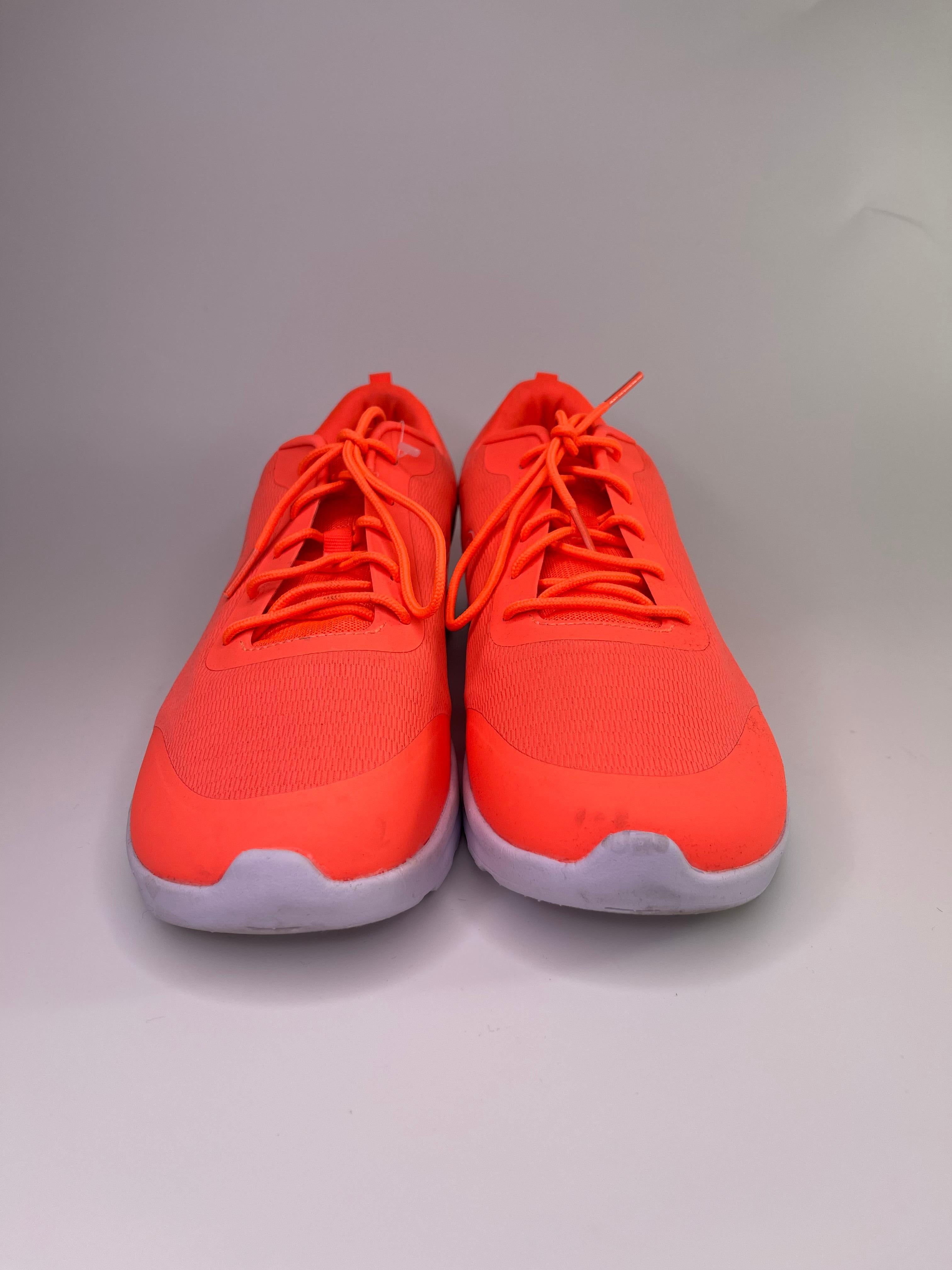 COLOR: Neon Orange
MATERIAL: Synthetic
ITEM CODE: 167602
SIZE: 12 US
COMES WITH: Shoe box
CONDITION: Used once. Under-soles are dirty, but can be cleaned to look new. 

Made in China