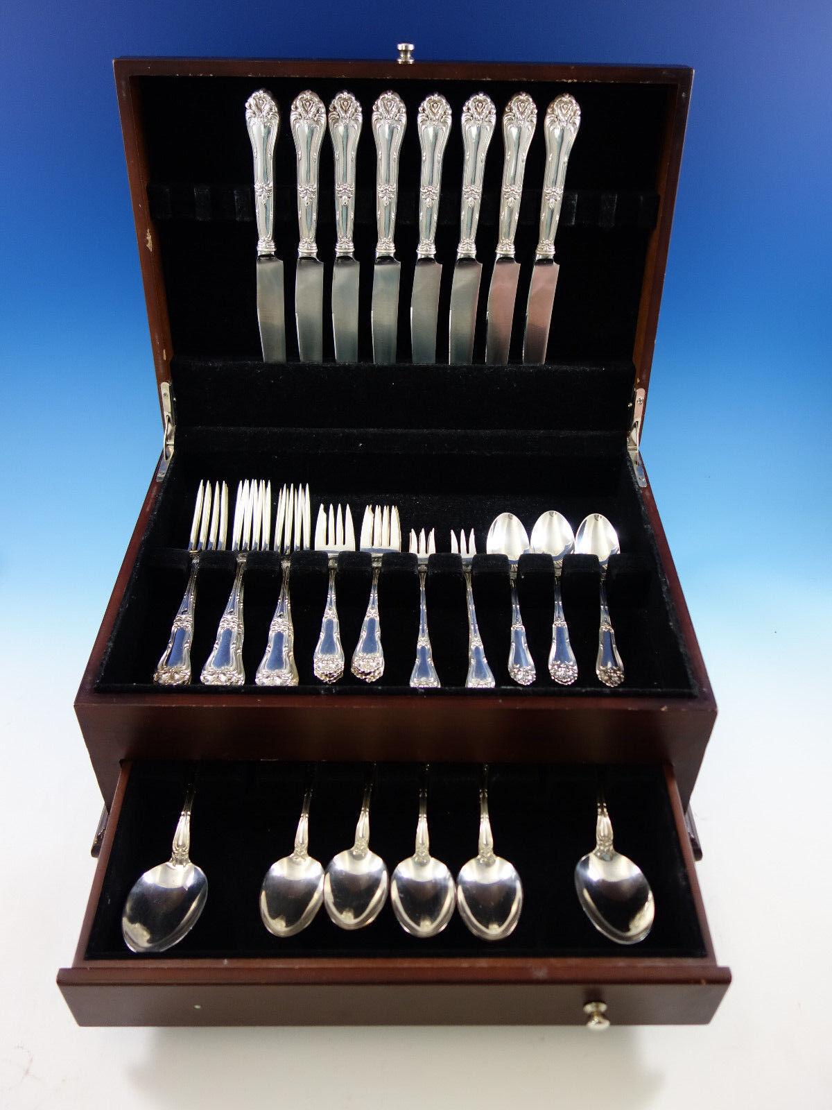 Dinner size champlain by Frank Whiting sterling silver flatware set - 50 pieces. This set includes:

8 Dinner size knives, 9 3/4